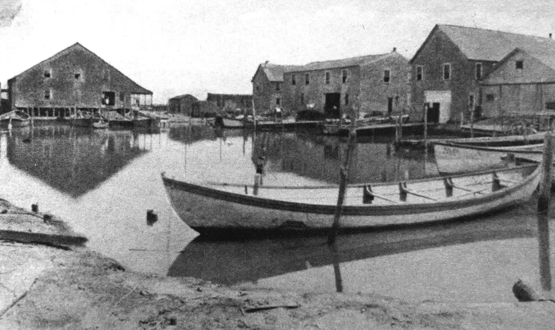Courtesy of the Sea Isle City Historical Museum. Pound fishing houses and boats, early 1900s. 