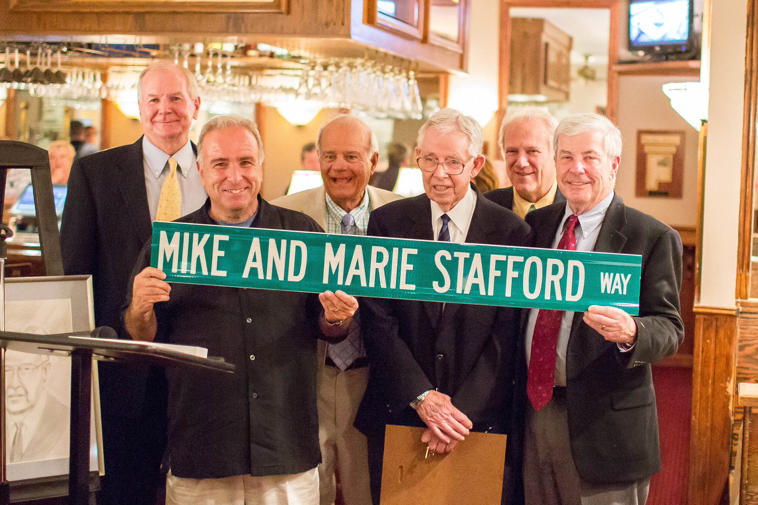 Mike McHale, Mayor Leonard Desiderio, Jack Gibson, Bill Kehner and John Divney presented Mike Stafford with a special street sign in 2015 for the entrance to the Library/Historical Museum. 