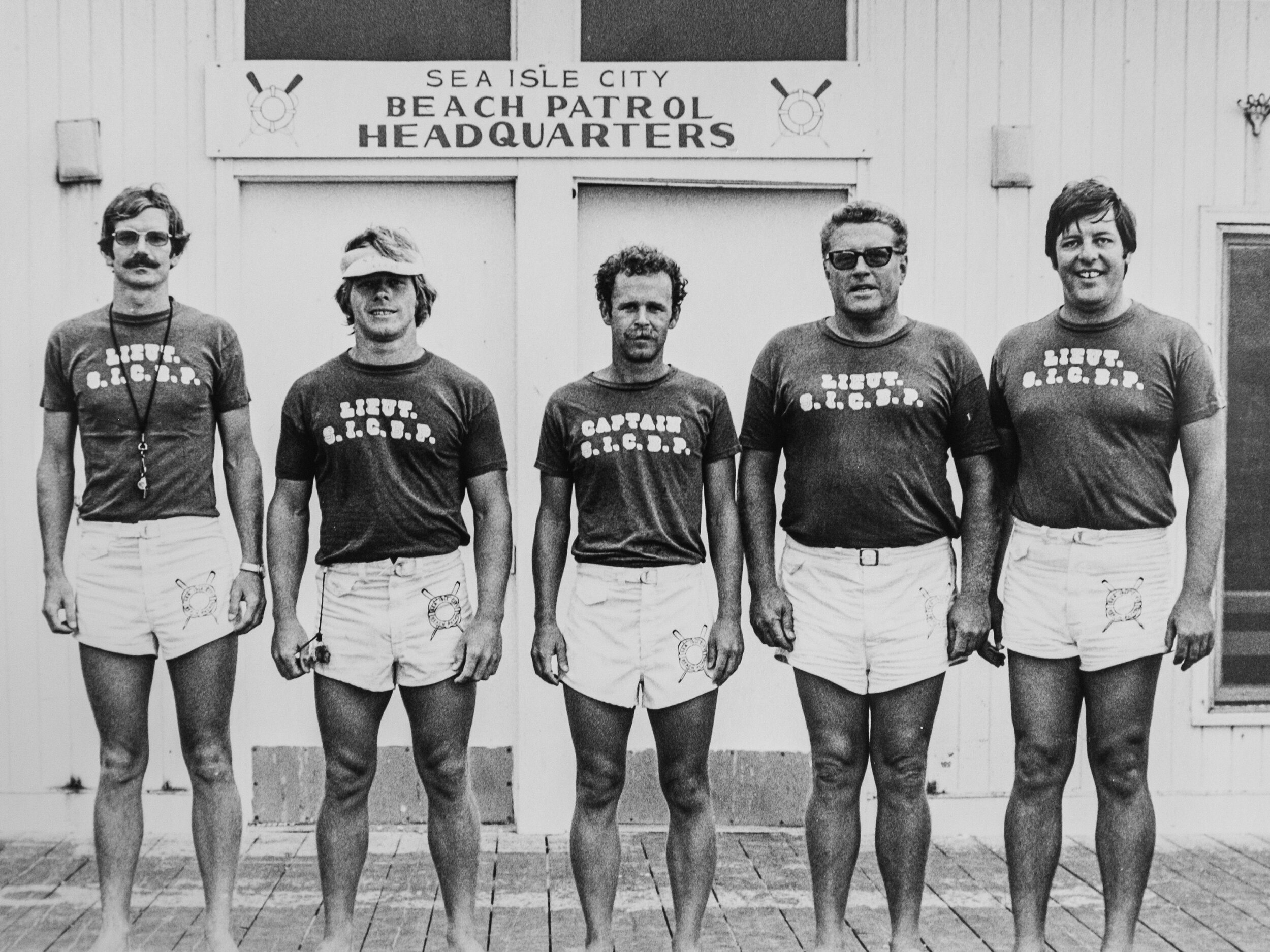  Beach Patrol administration in the early 1970s: Captain Bill Gallagher (center) is flanked by  lieutenants (from left) Mike McHale, Tom McCann, Stu Bakely and Jerry Gehman.