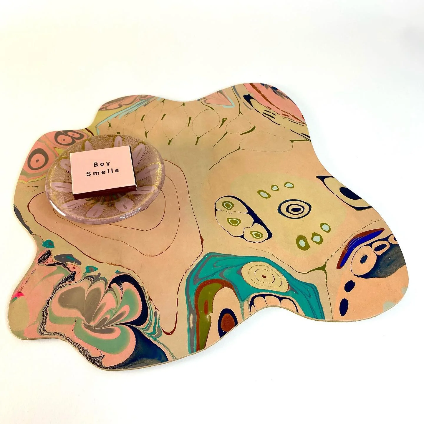 Coming soon: Blob centerpieces, backed with suede.