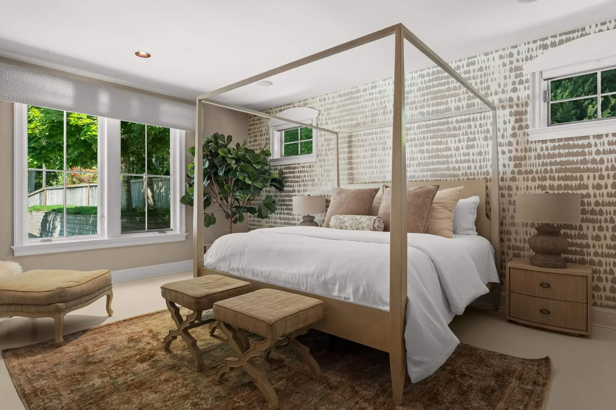 Main floor primary suite at 12210 Osprey Drive.jpg