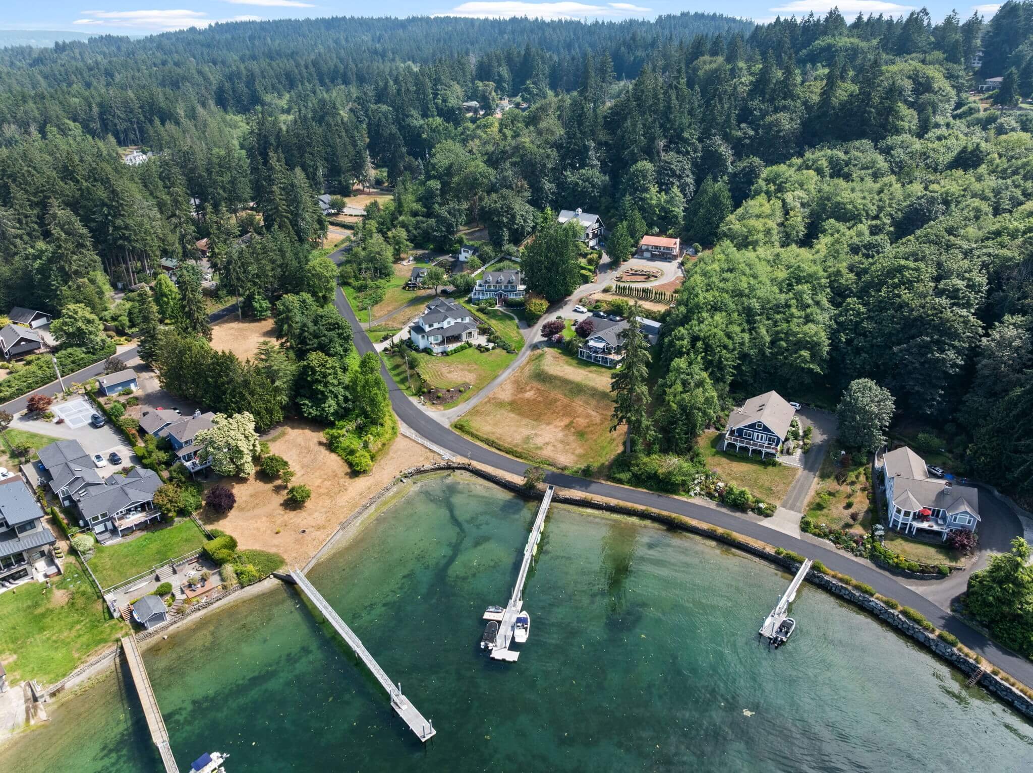 Low bank waterfront home with private dock on Gig Harbor Sound