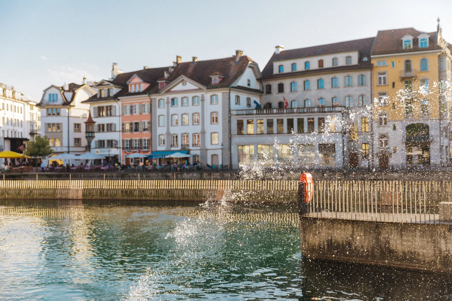 Colorful old town buildings beside the river in Lucerne
