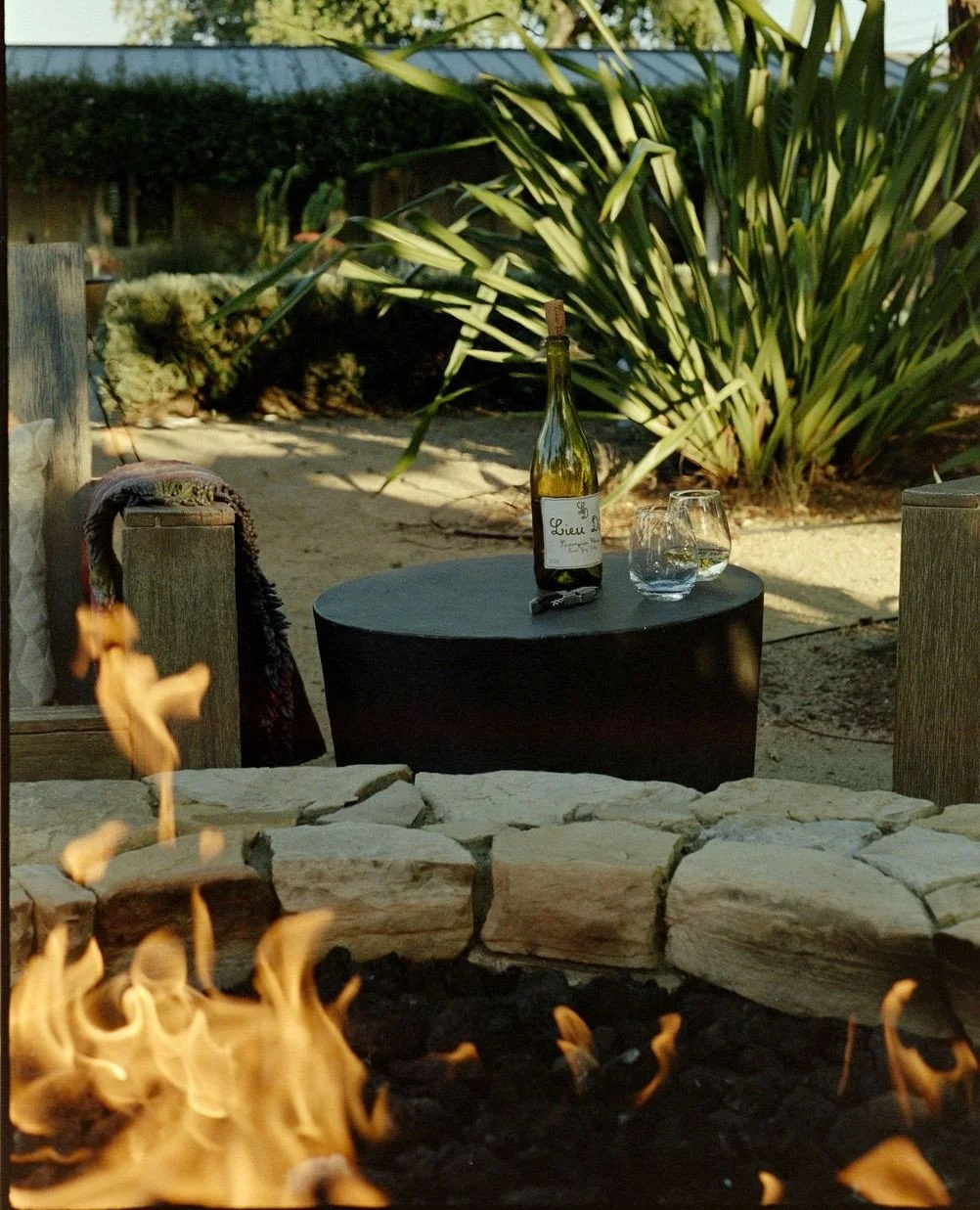 Unwinding by the bottle and by the fire. ⁠
⁠
.⁠
.⁠
.⁠
⁠
Photo: @everwavecreative