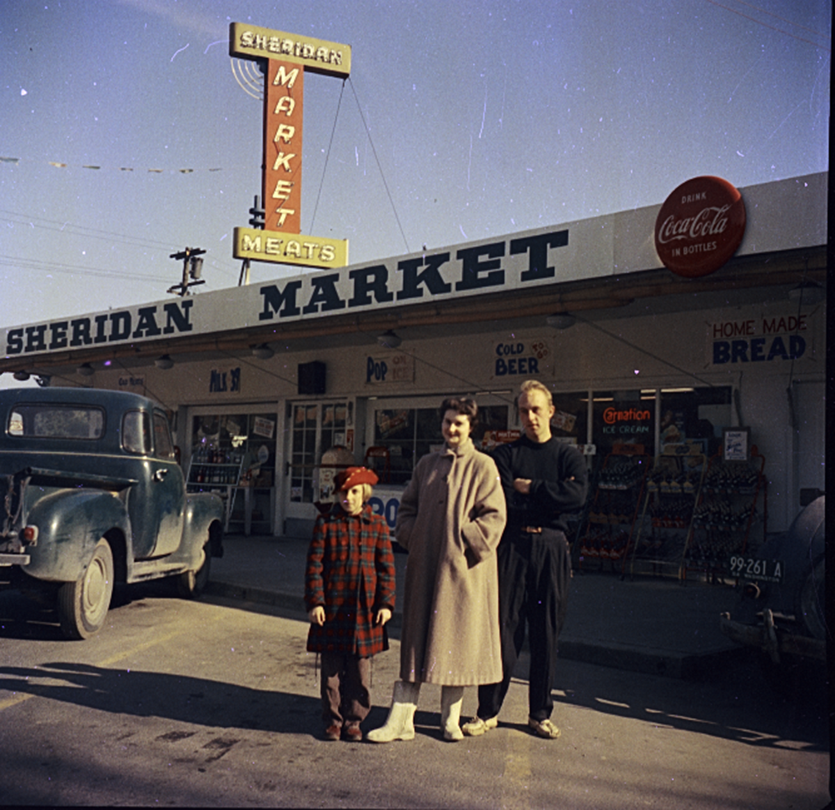 Family in front of Store