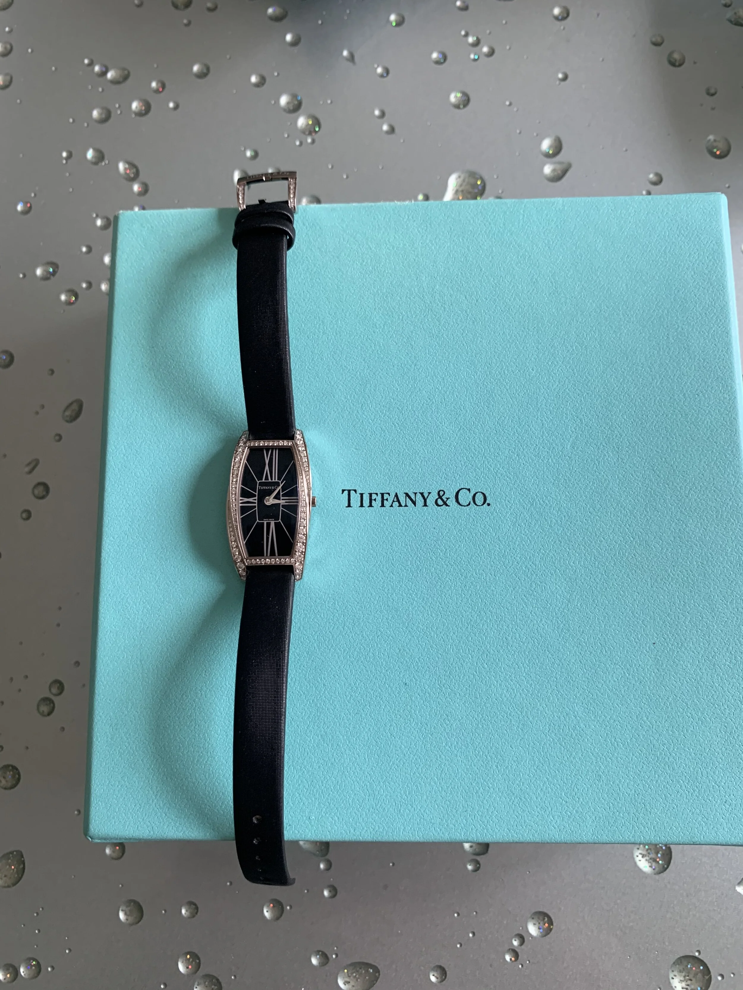 Tiffany: Diamond Bezel and Black Dial