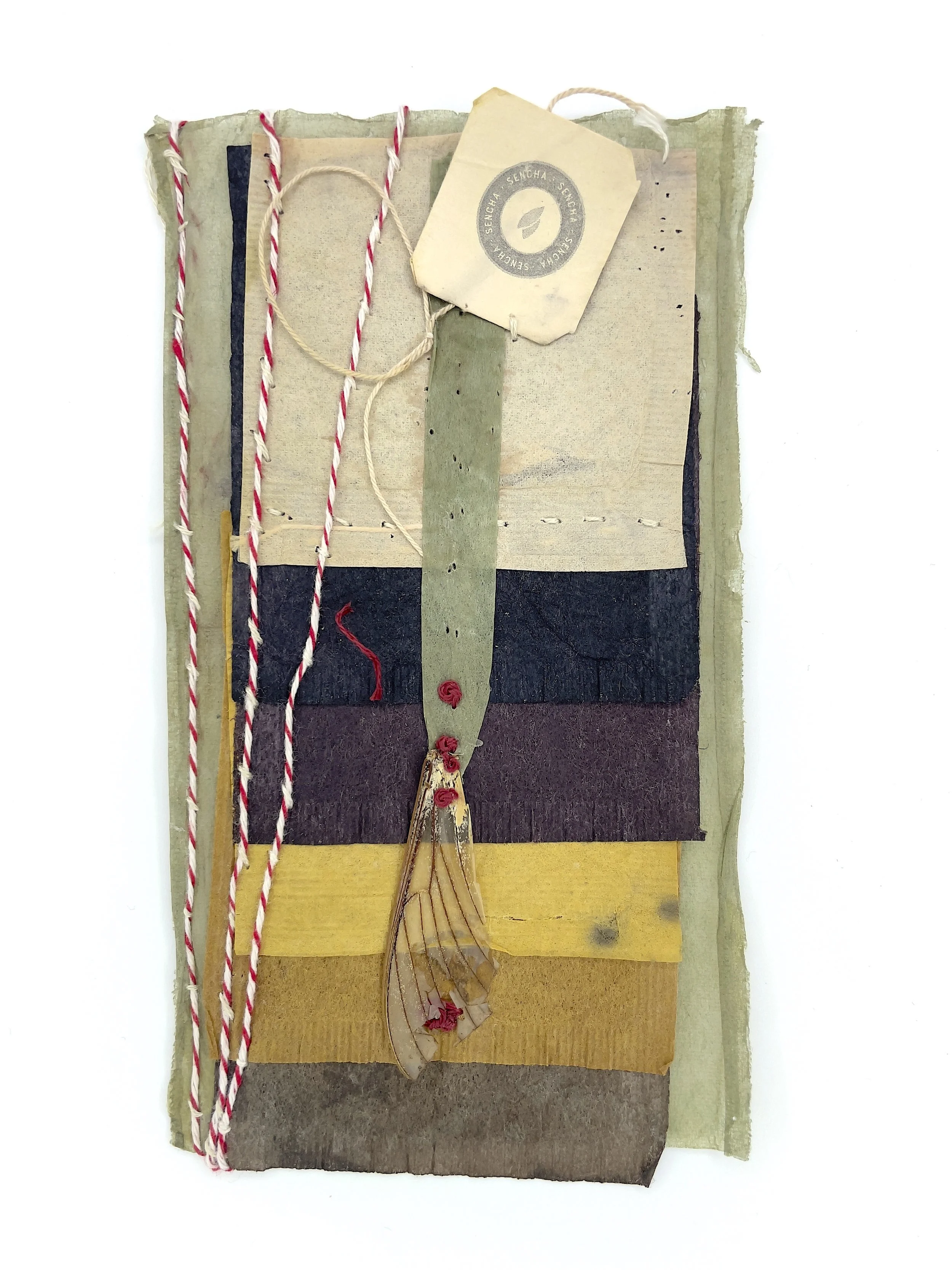 Marking Time 77 , 2023, dragonfly wing, teabag label, thread, oak gall, sunflower, and walnut ink dyed teabags, 5.5 x 3.25 inches (unframed), 11.25 x 9.25 inches (framed), $475. (framed)