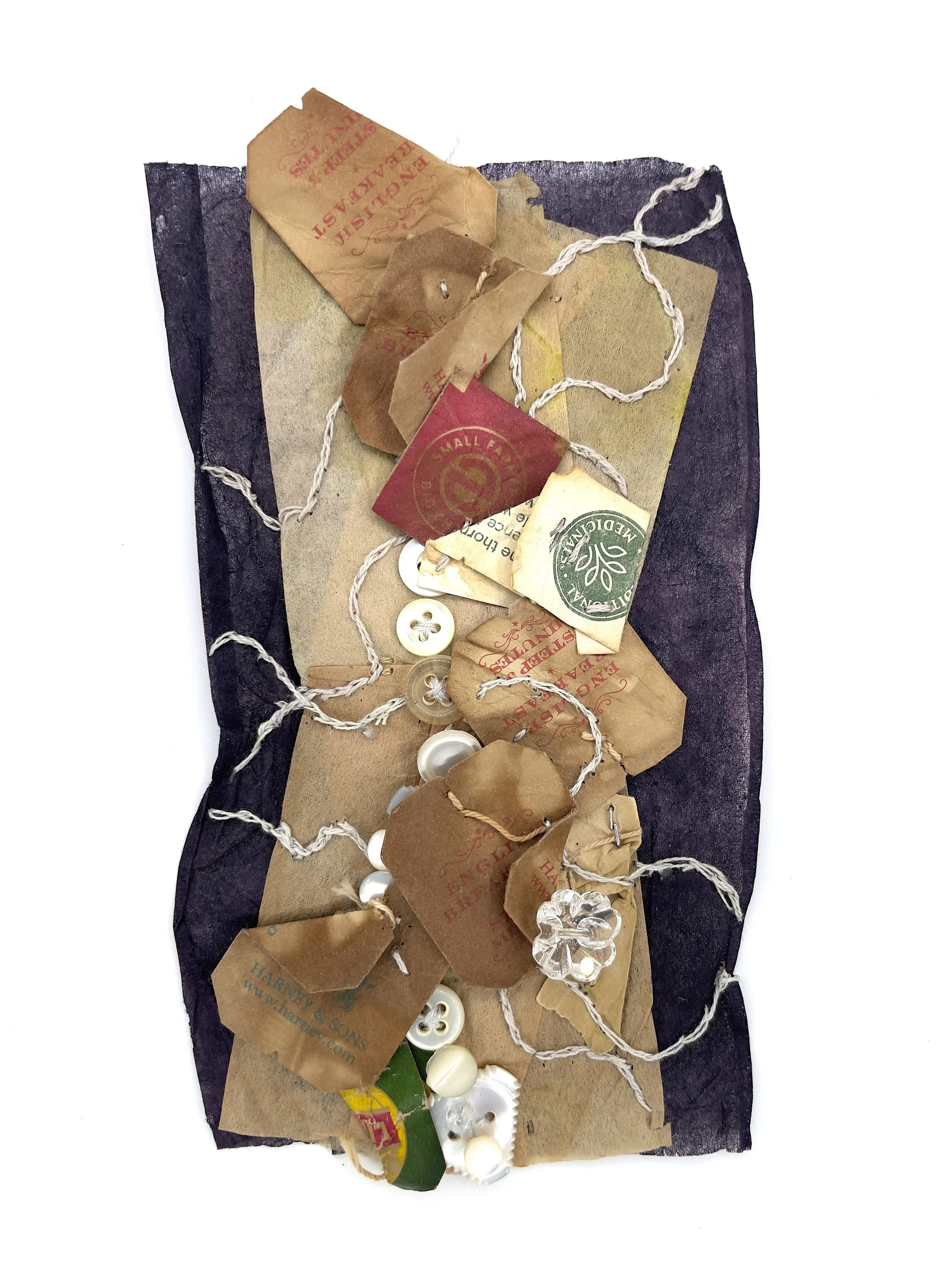 Marking Time 82 , 2023, buttons, paper, thread, oak gall ink and sunflower ink dyed teabags, 5.5 x 3.25 inches (unframed), 11.25 x 9.25 inches (framed), $475. (framed)