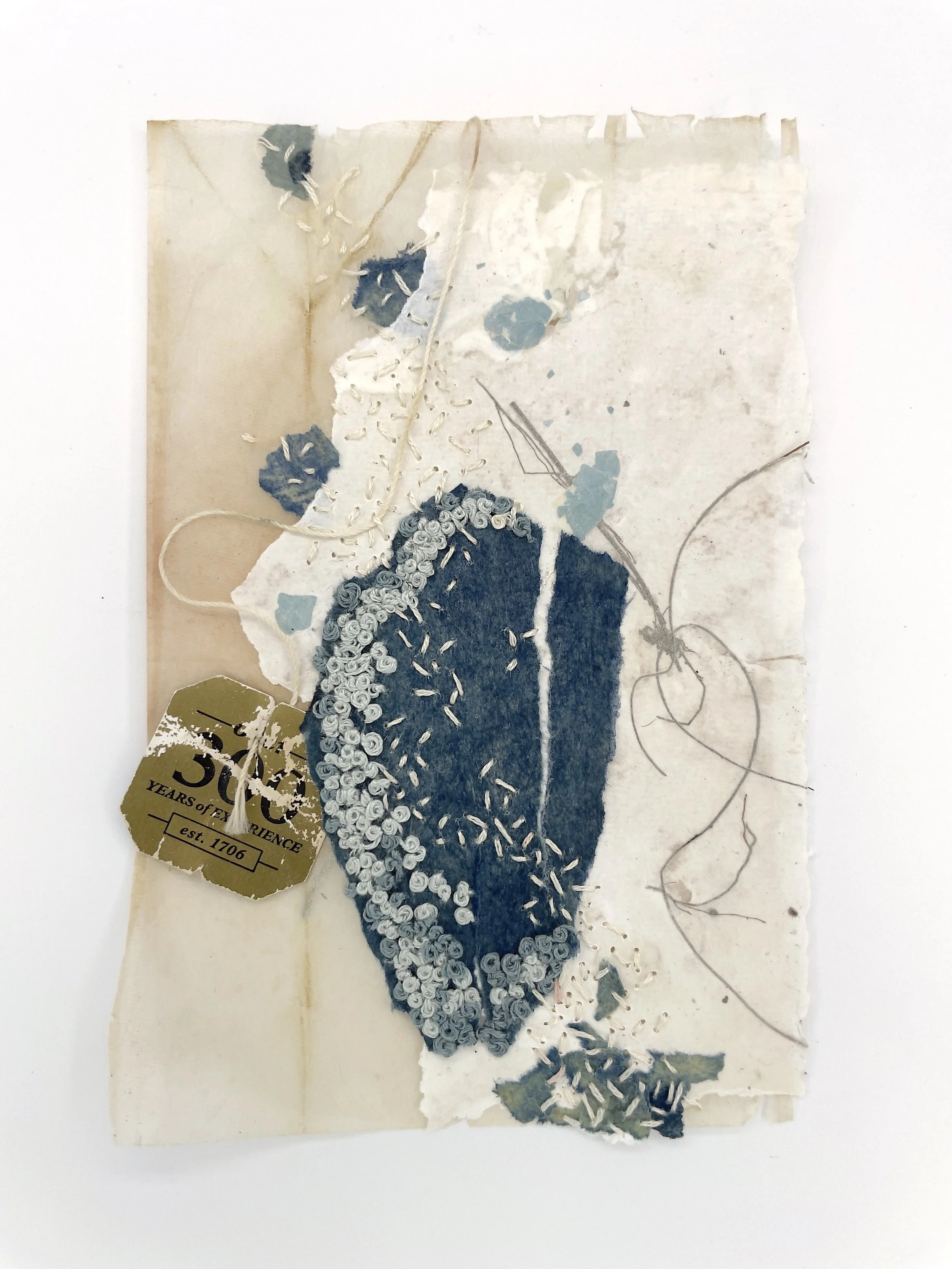Marking Time 89 , 2023, handmade paper embedded with eggshells and deconstructed bird nest, paper, monotype, thread, teabag, 5.5 x 3.25 inches (unframed), 11.25 x 9.25 inches (framed), $475. (framed)