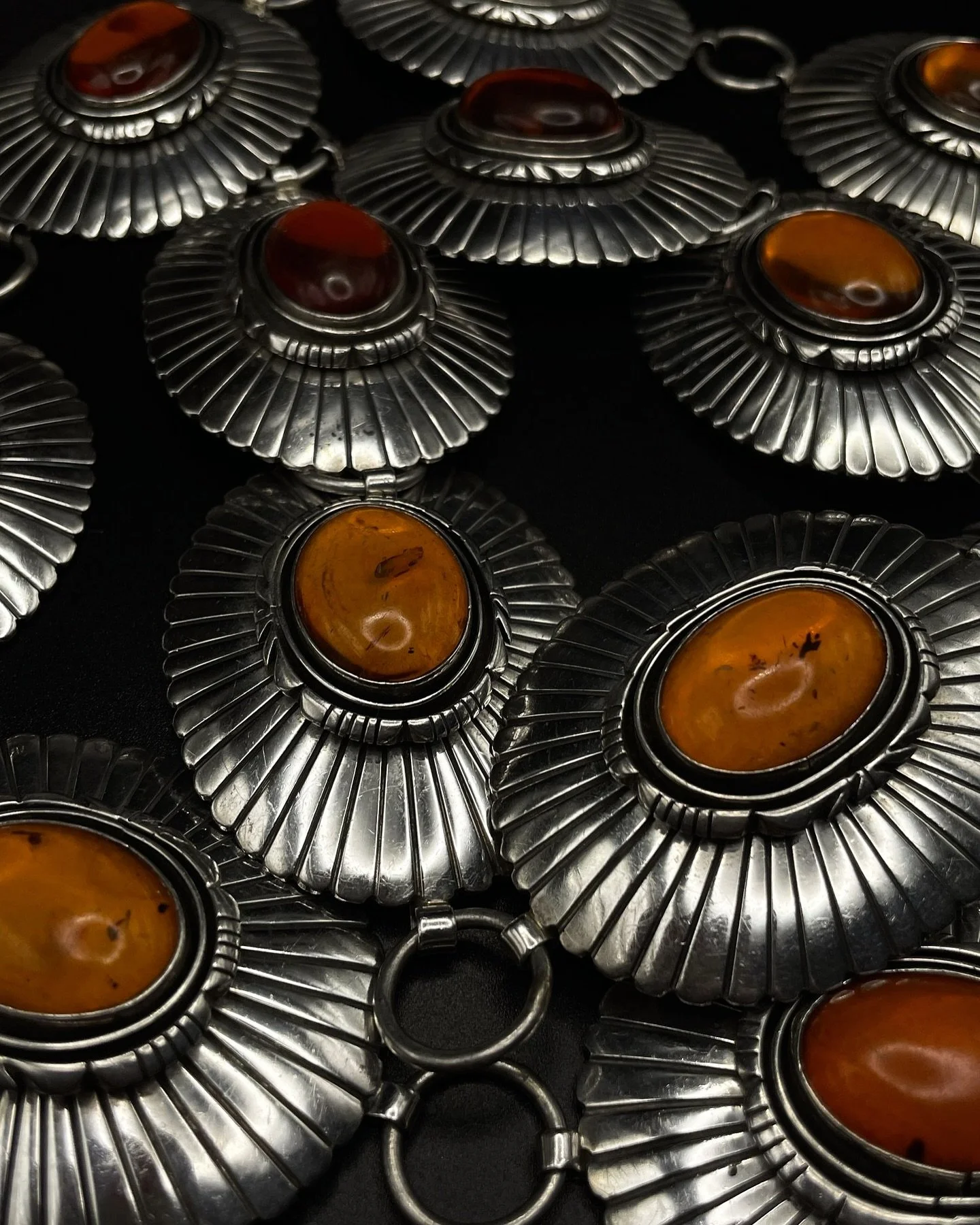 30% Off All Jewelry today through 8/8/24.
Discount Automatically Applied at Checkout.

&gt;&gt;&lt;&lt;

1960s-70s Amber Concho Belt

This is a vintage, hefty, amber and sterling silver concho belt coming from the 1960&rsquo;s or 70&rsquo;s. I come a