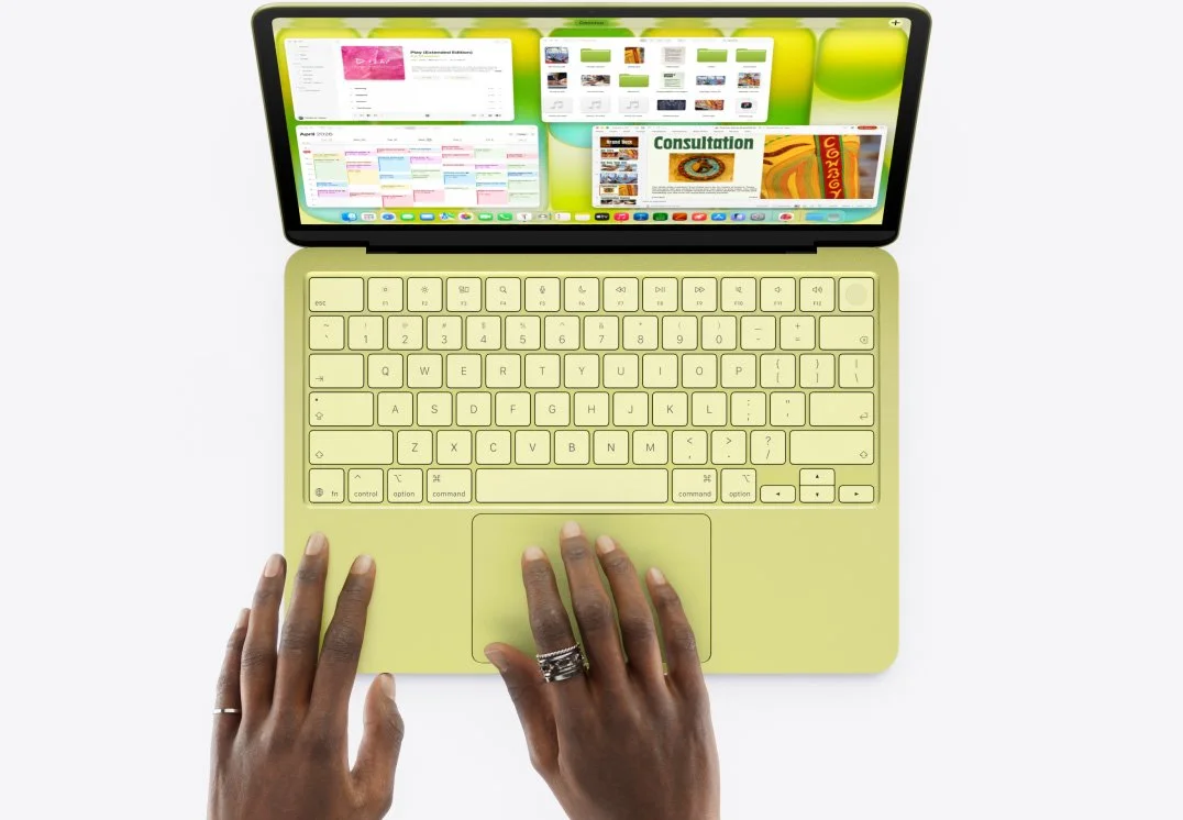 image of the new MacBook Neo top down view open laptop, keyboard visible, screen angled