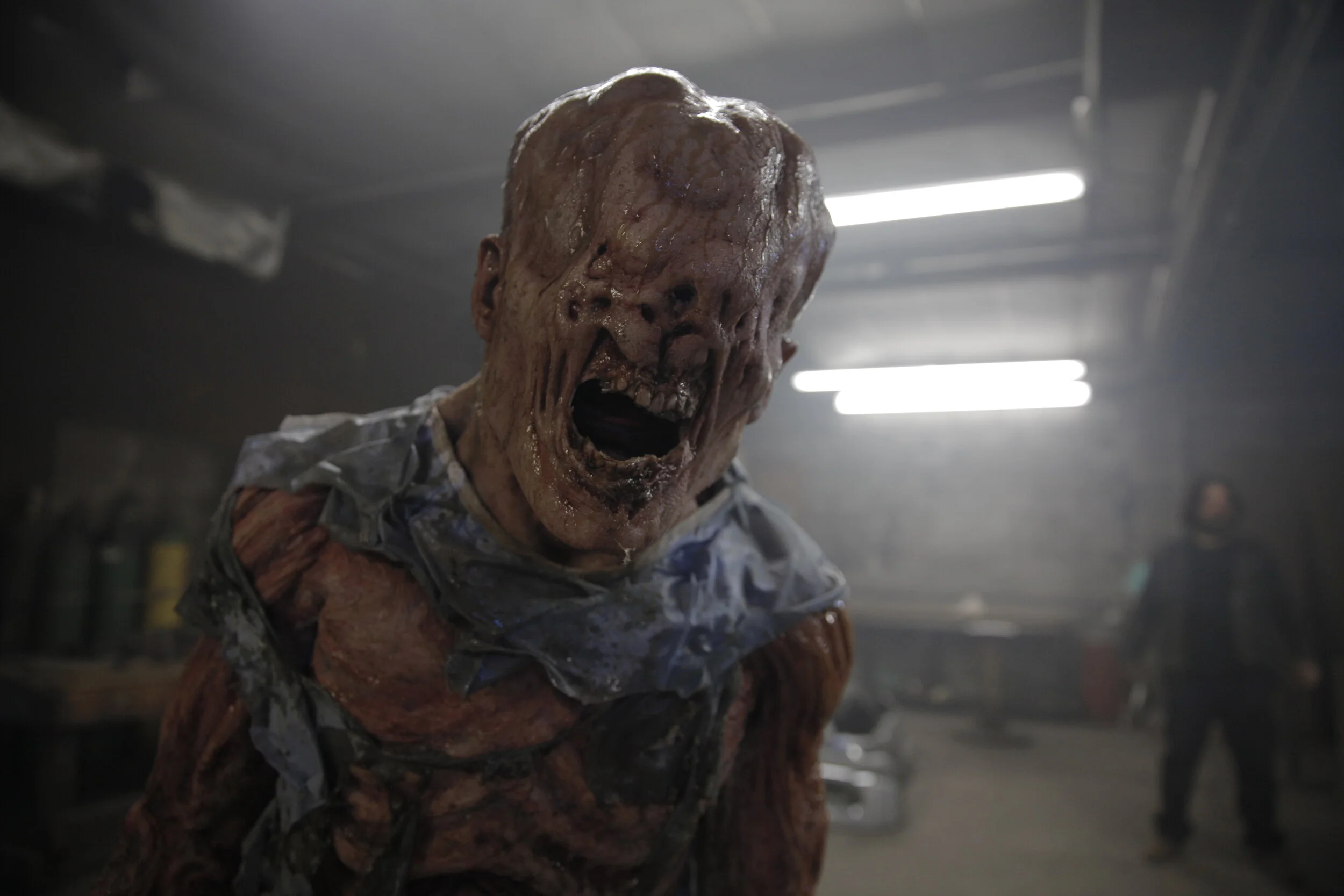 The suit version. The silicone mask has a fiberglass underskull attached to a skullcap on the actor to reduce the weight.