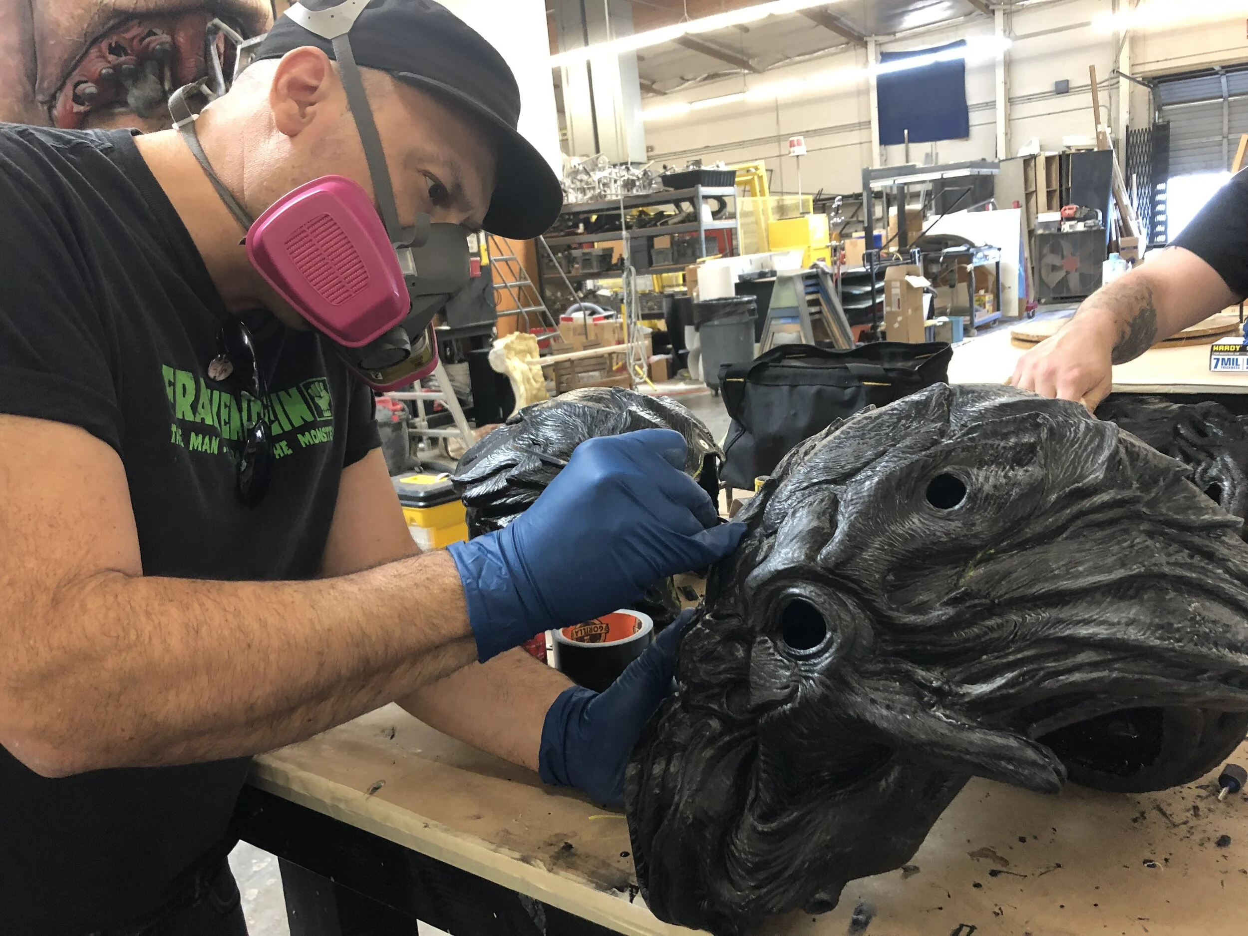 Fred Manchento works on the new set of heads