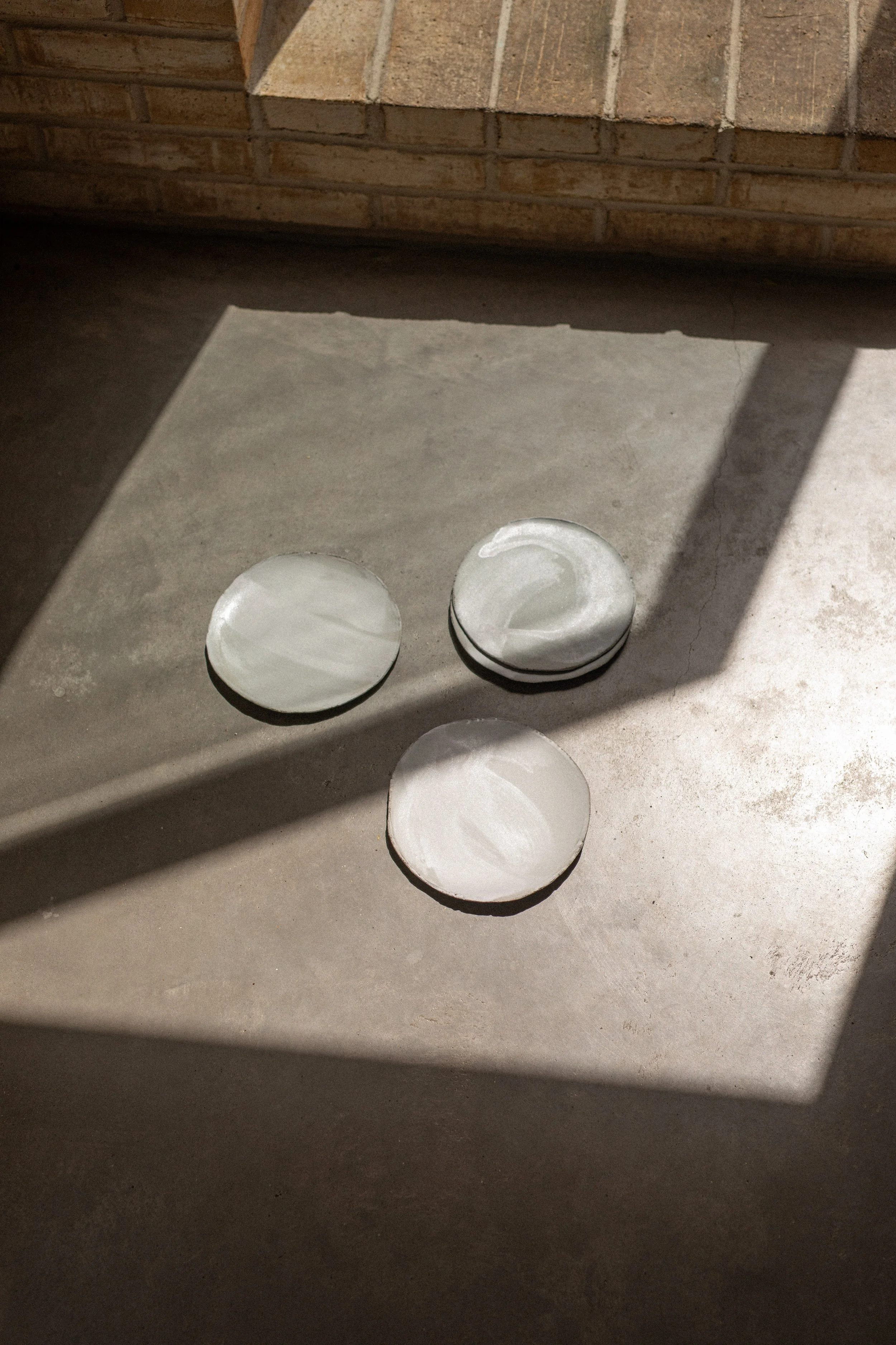 Grey Plates by Lisa Stockham