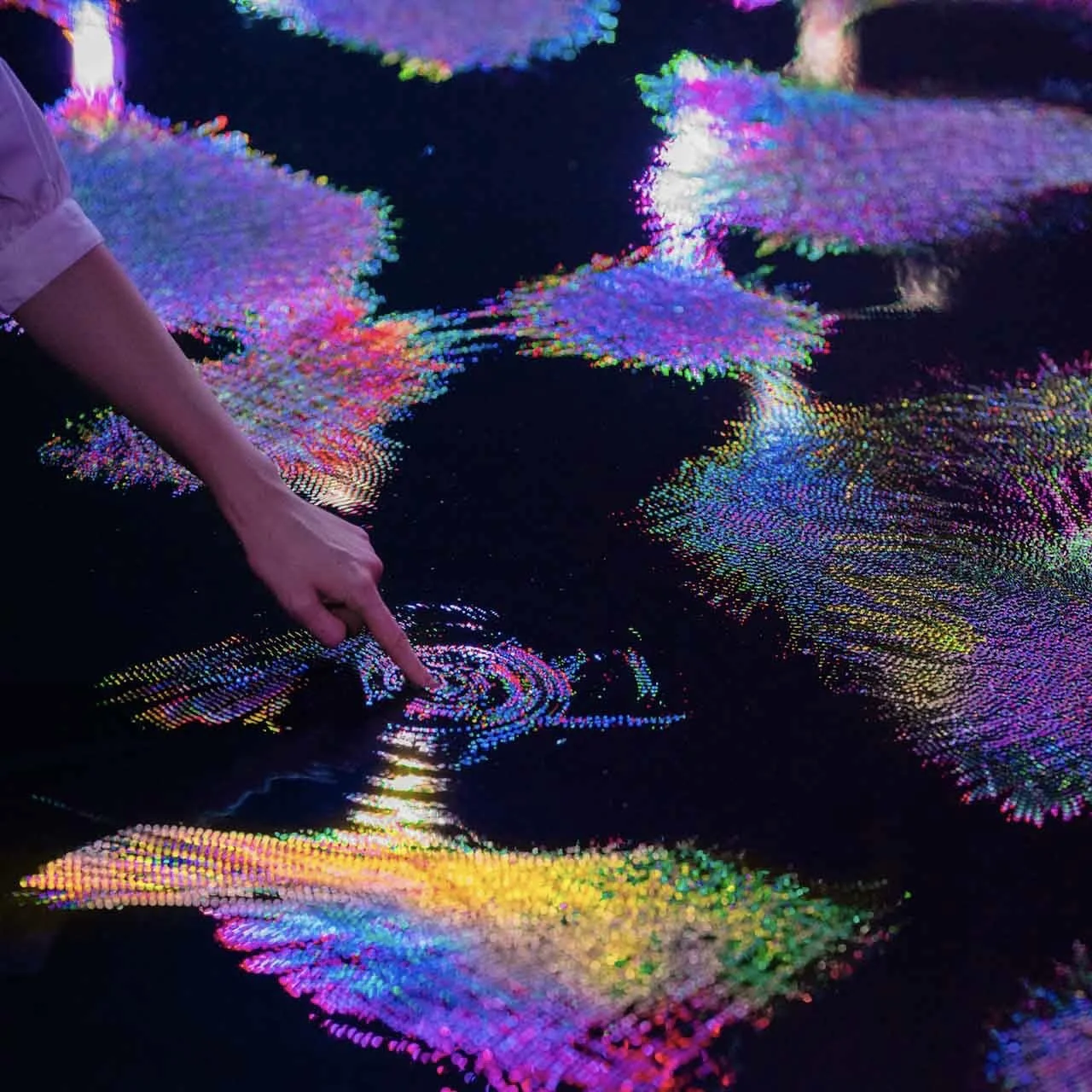 12 SPOTLIGHT: teamLab