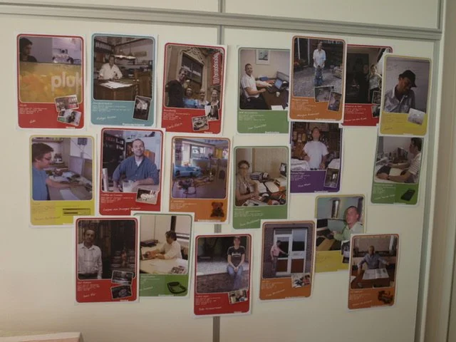 Collage of various photographs showing people working at desks and in offices, each framed with colorful borders.