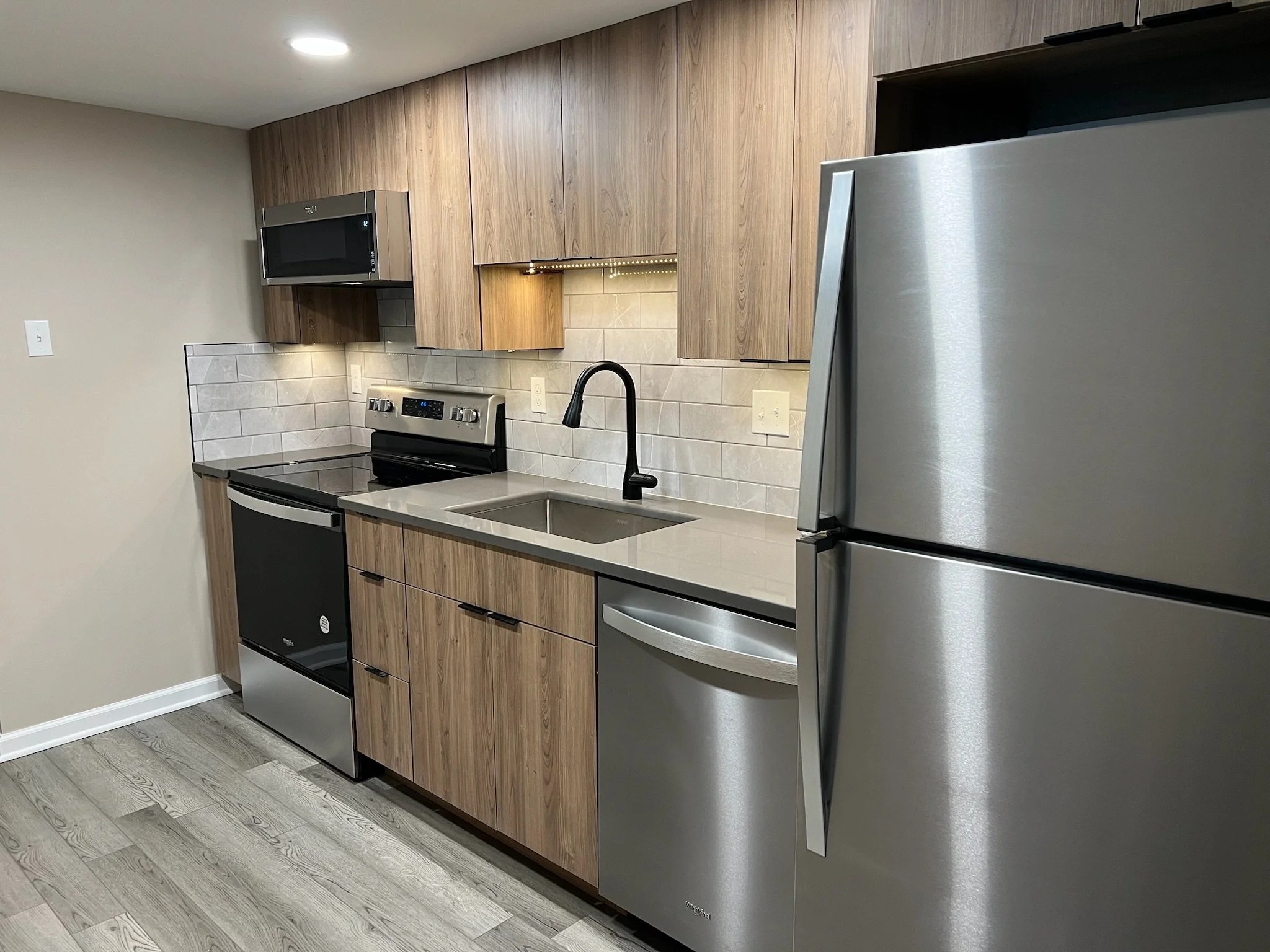Modern kitchen update in kirwood condo remodel