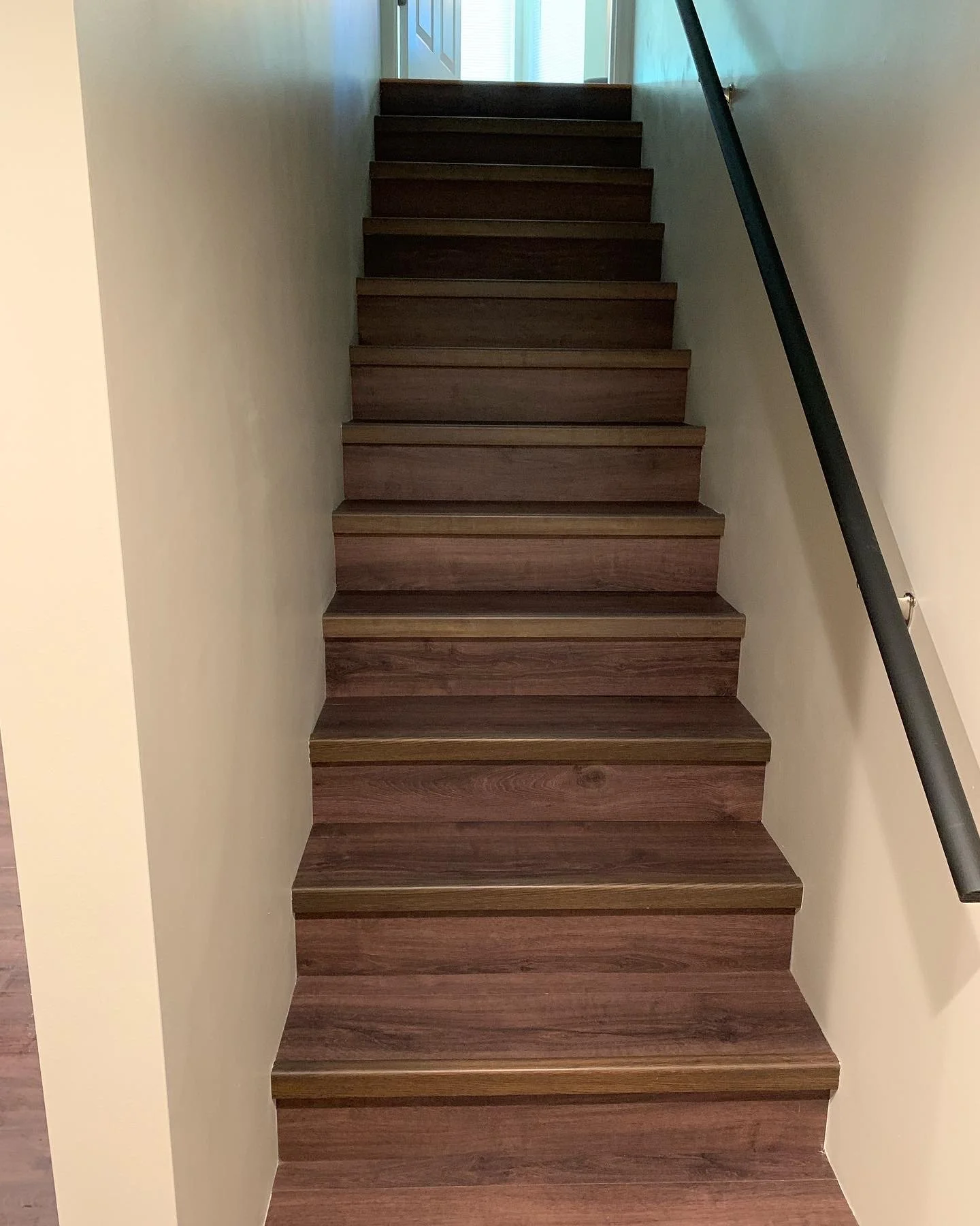 LVP stairs to remodeled basement