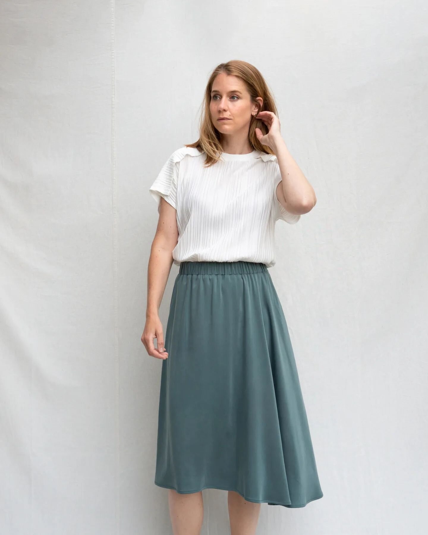 The white plisse top. ⁠
Made out of a deadstock plisse fabric &amp; the neckline is made from cutoffs from the white sweater ♻️.⁠
Looks great with the asymmetrical dusty green skirt 💚⁠
⁠
Available in the webshop, link in bio⁠
⁠
⁠
⁠
#sustainablewebsh