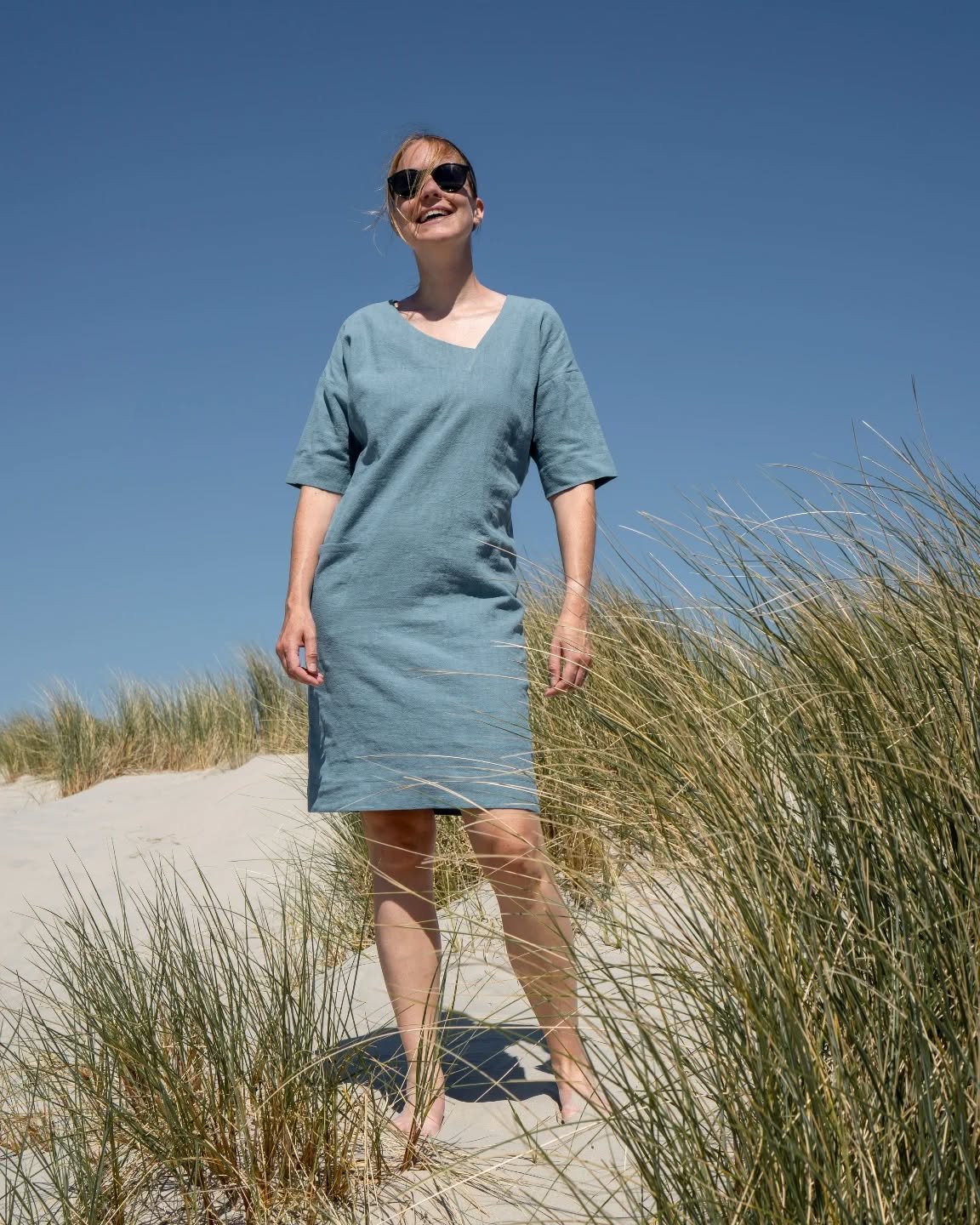 The asymmetrical dress with pocket in a blue hue, made from a washed linen. ⁠
#madeonorder --&gt; Made for you! Check out our webshop⁠
⁠
⁠
⁠
#duurzamekleding #linendress #madelocally #sustainablestyle #madeforyou⁠