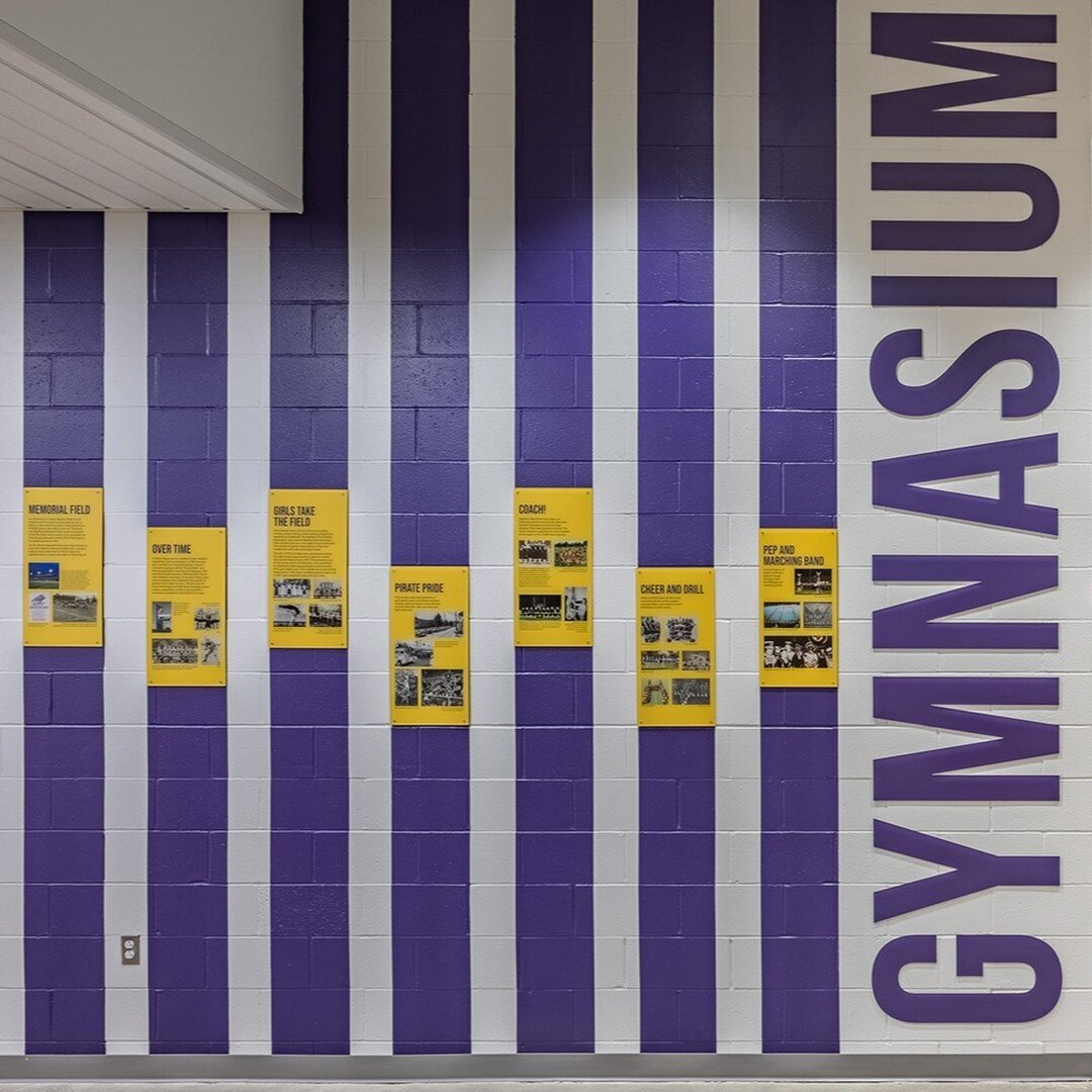 From the gymnasium to the library, we helped combine the old and the new in the halls of Highland High School. The monumental text uses acrylic and custom enamel paint to celebrate the newly constructed landmarks within the school. The feature walls 