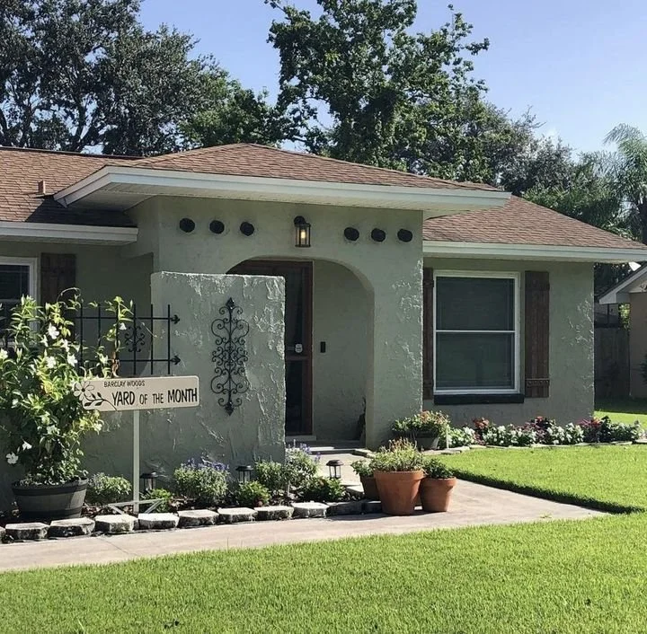Empire Zoysia sod installation at a home with landscaped beds in Central Florida