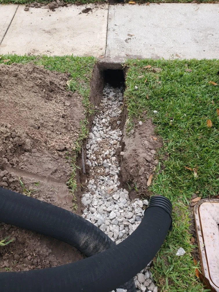 Winter Park 32789 Drainage Solutions | French Drain under sidewalk | Michael Geist's Yard Works