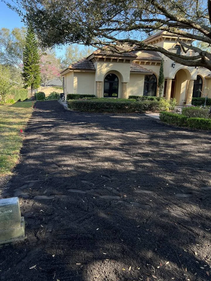 Compost-amended and graded soil ready for new sod at a Winter Park Florida estate