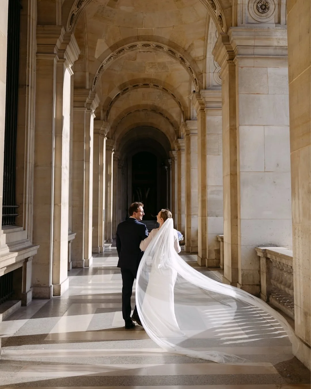 The perfect Parisian wedding.
The day began with a religious ceremony in one of the oldest churches in Paris, a listed historical monument. We then wandered through the iconic Louvre for some of the most romantic couple photos, bathed in an absolutel
