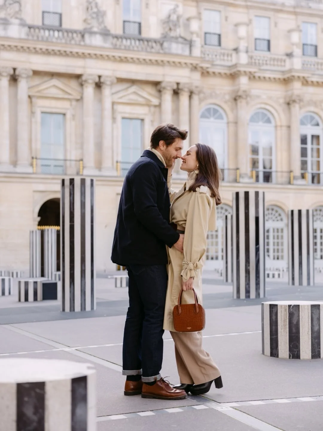 Paris couple photographer | A winter morning at the Palais Royal, and it felt like reuniting with old friends. 

A few years ago, I had the honour of documenting their wedding day, and I was so glad to meet them for a new couple photoshoot in Paris!
