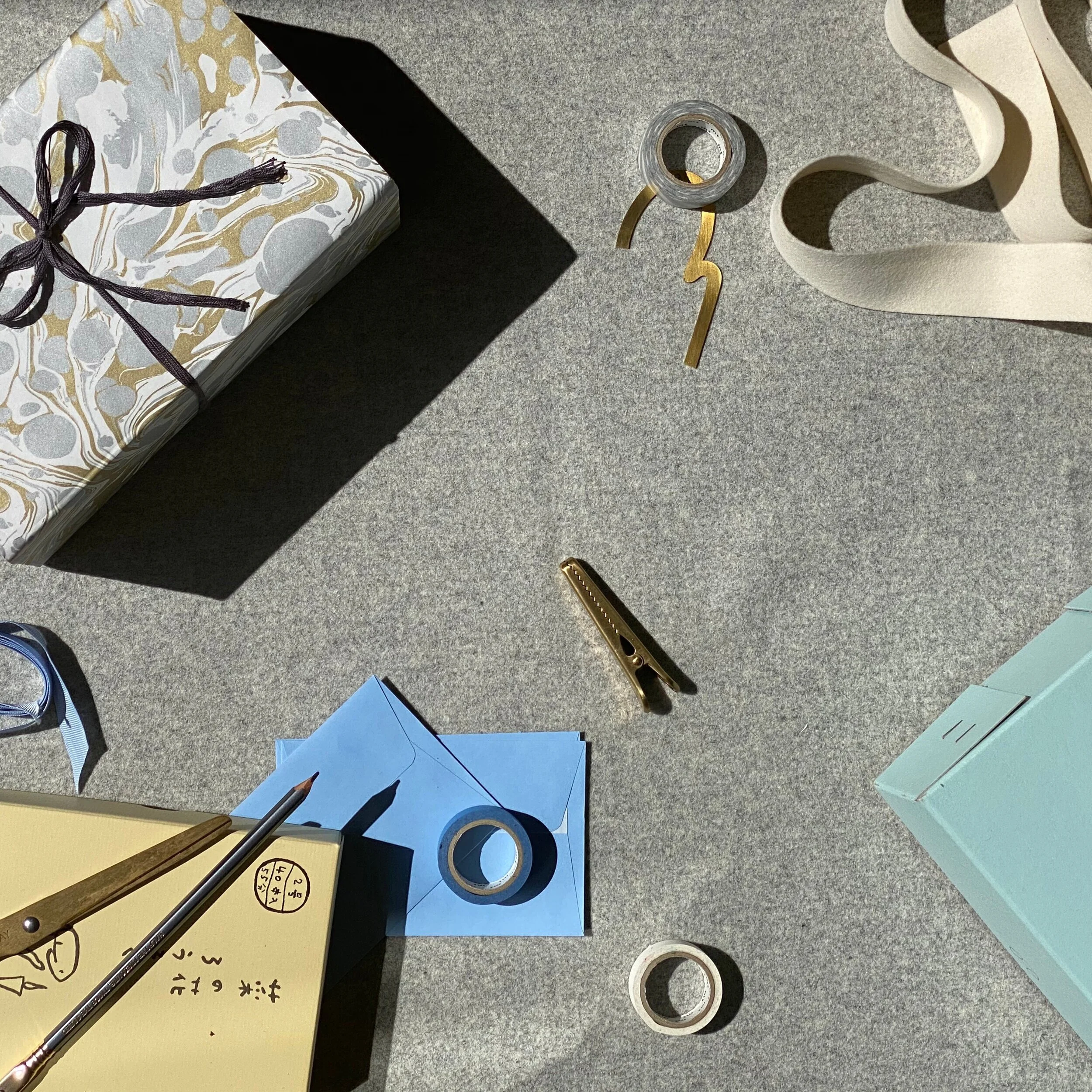 Beautifully wrapped gift in gold and silver paper. At Magpie &amp; Co, we offer complimentary gift wrapping.