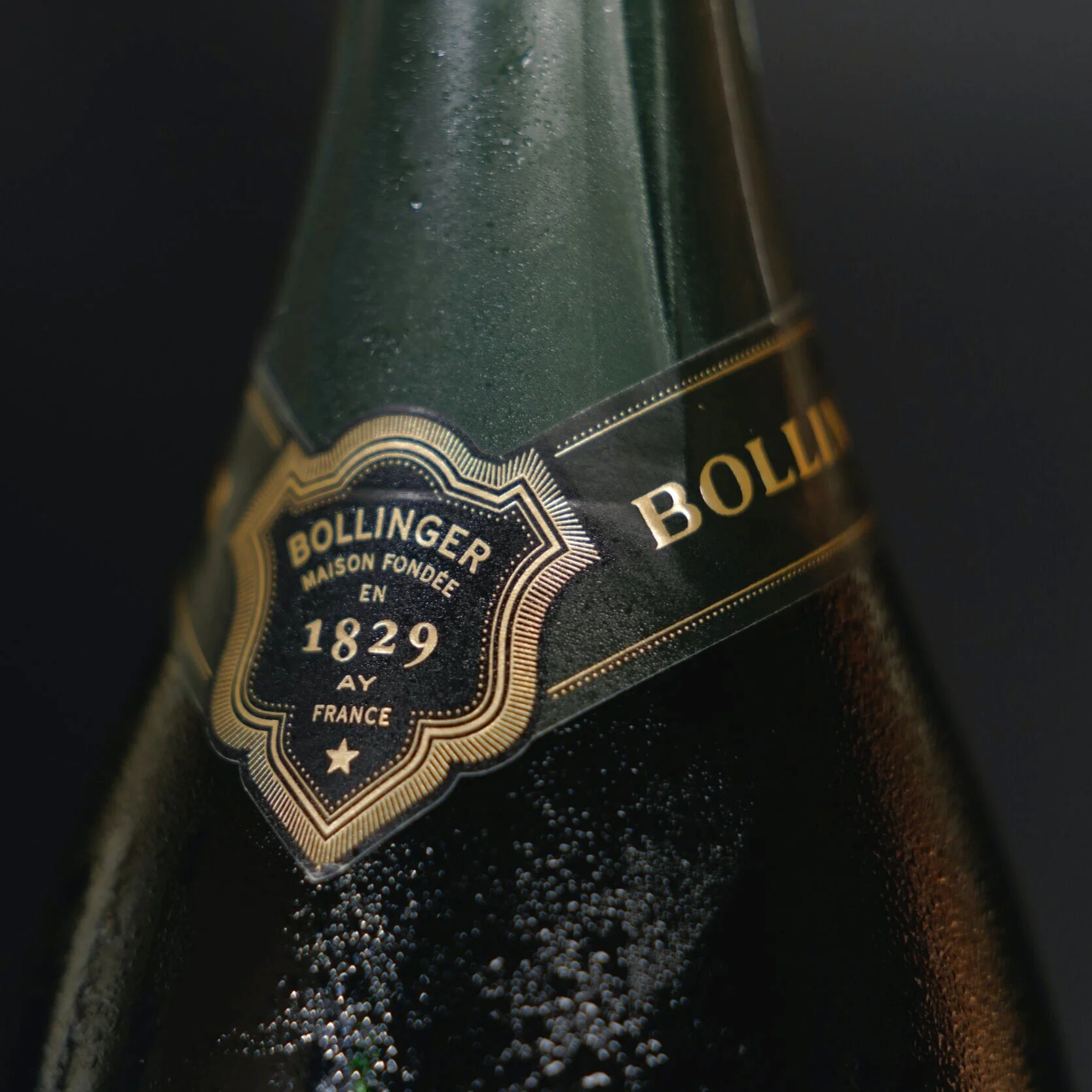 We source vintage Bollinger Champagne for a birthday gift.