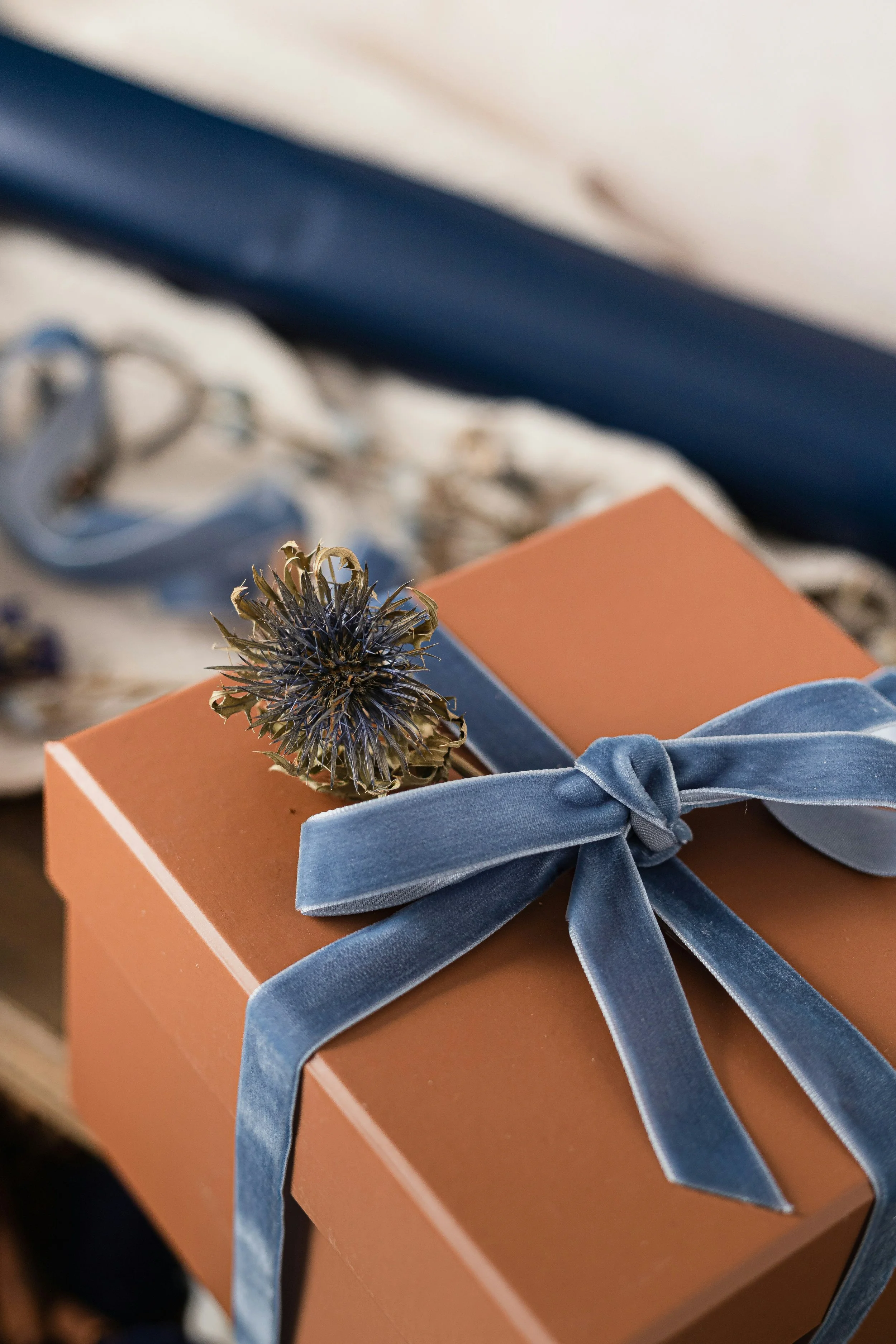 Gift boxes, ribbon and tape alongside a special birthday gift, which we sourced from Japan.