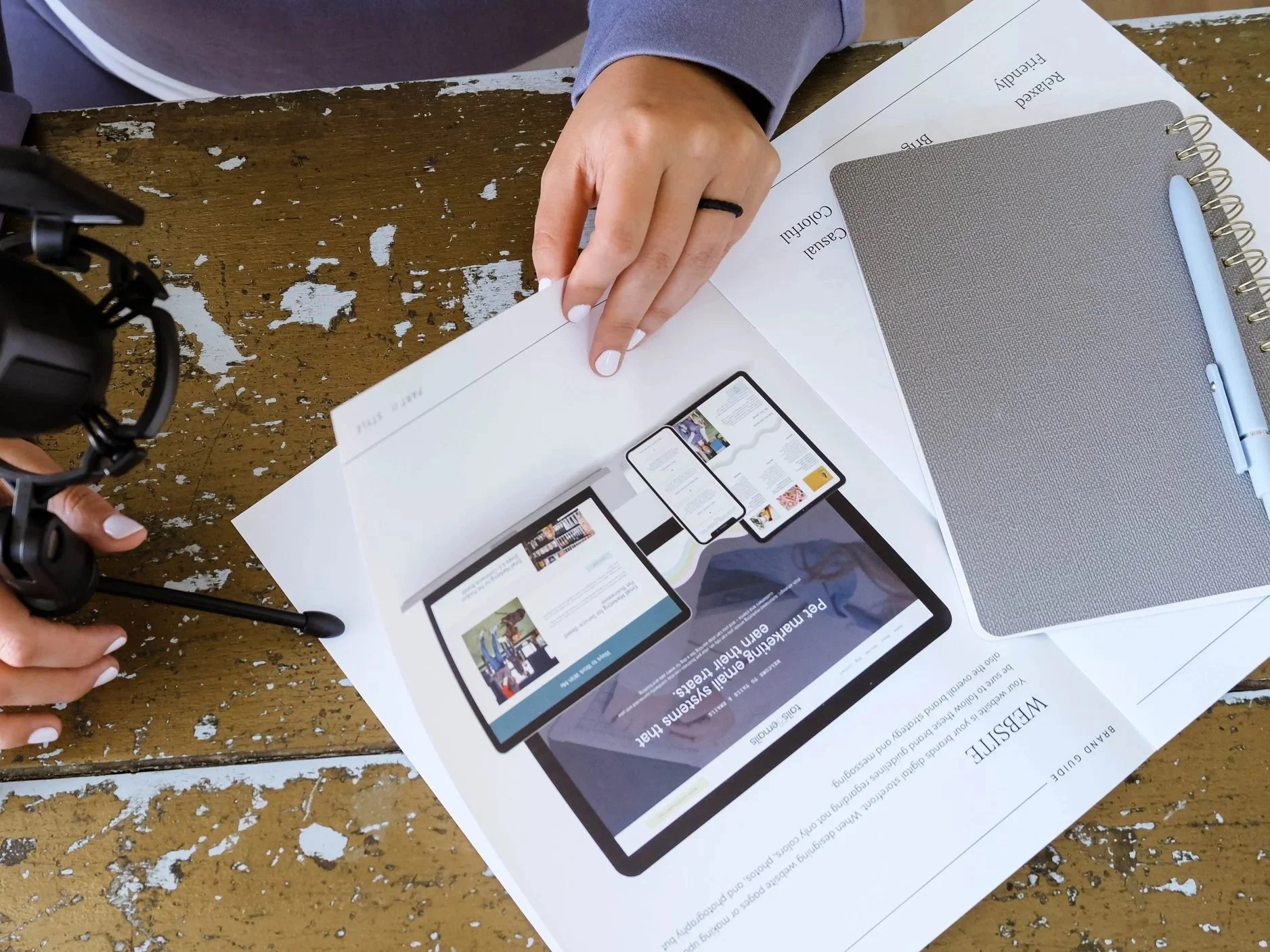 Podcast host morgan specht looking at branding document