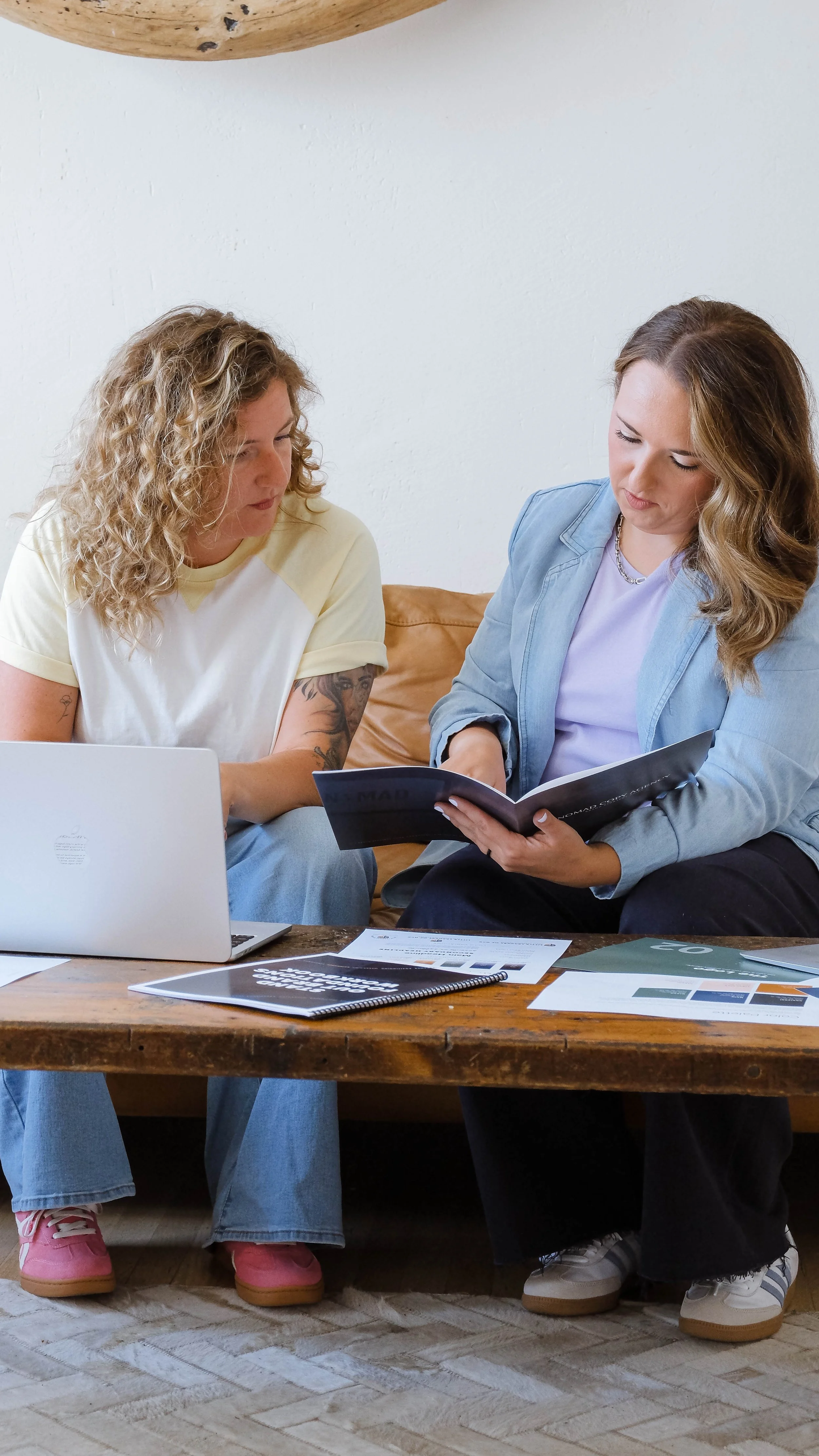 Brand designer Morgan Specht working with a client during a VIP Designer Day