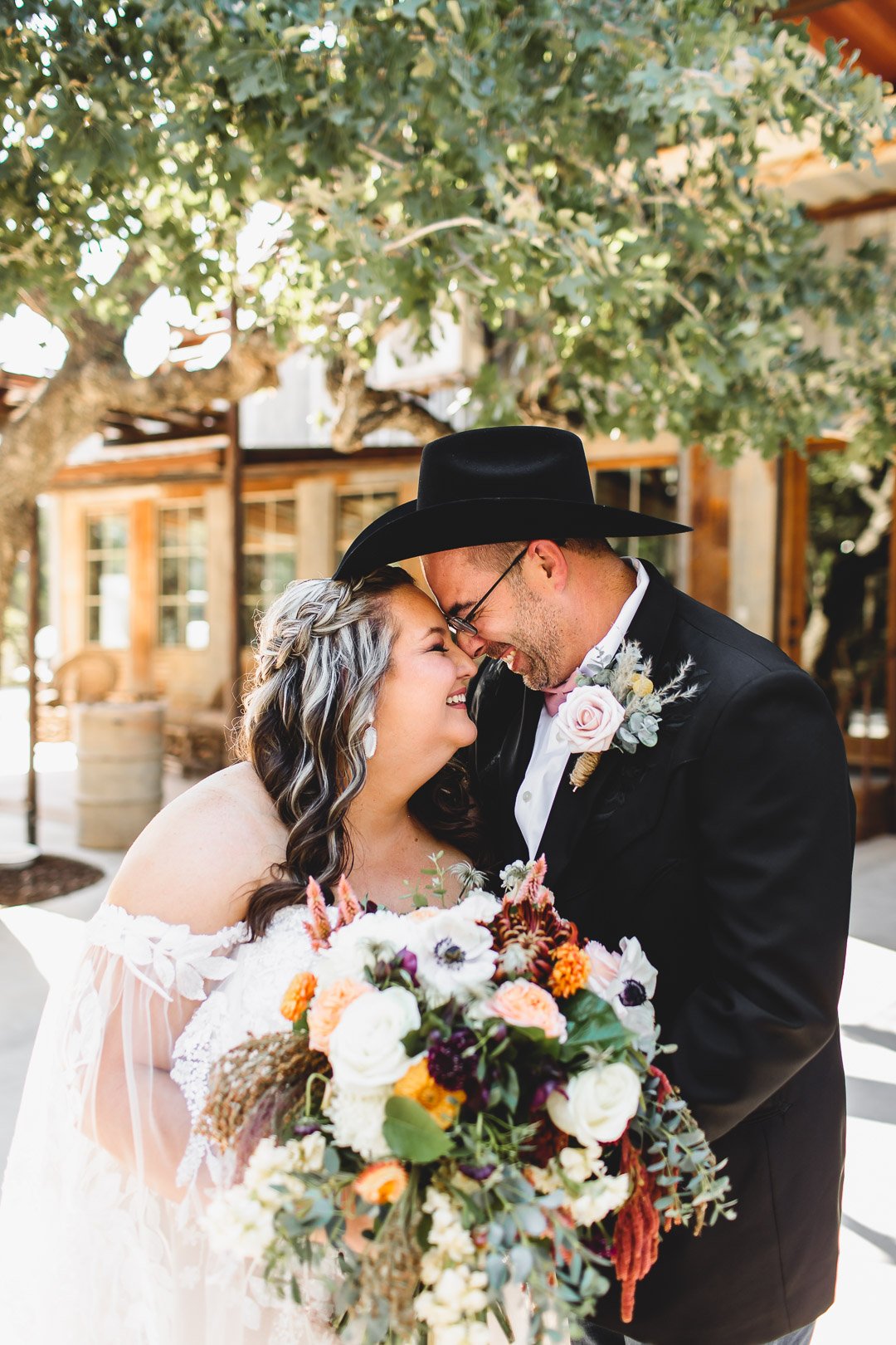 ranch-wedding-bold-florals-cowboy-hat (3).jpg