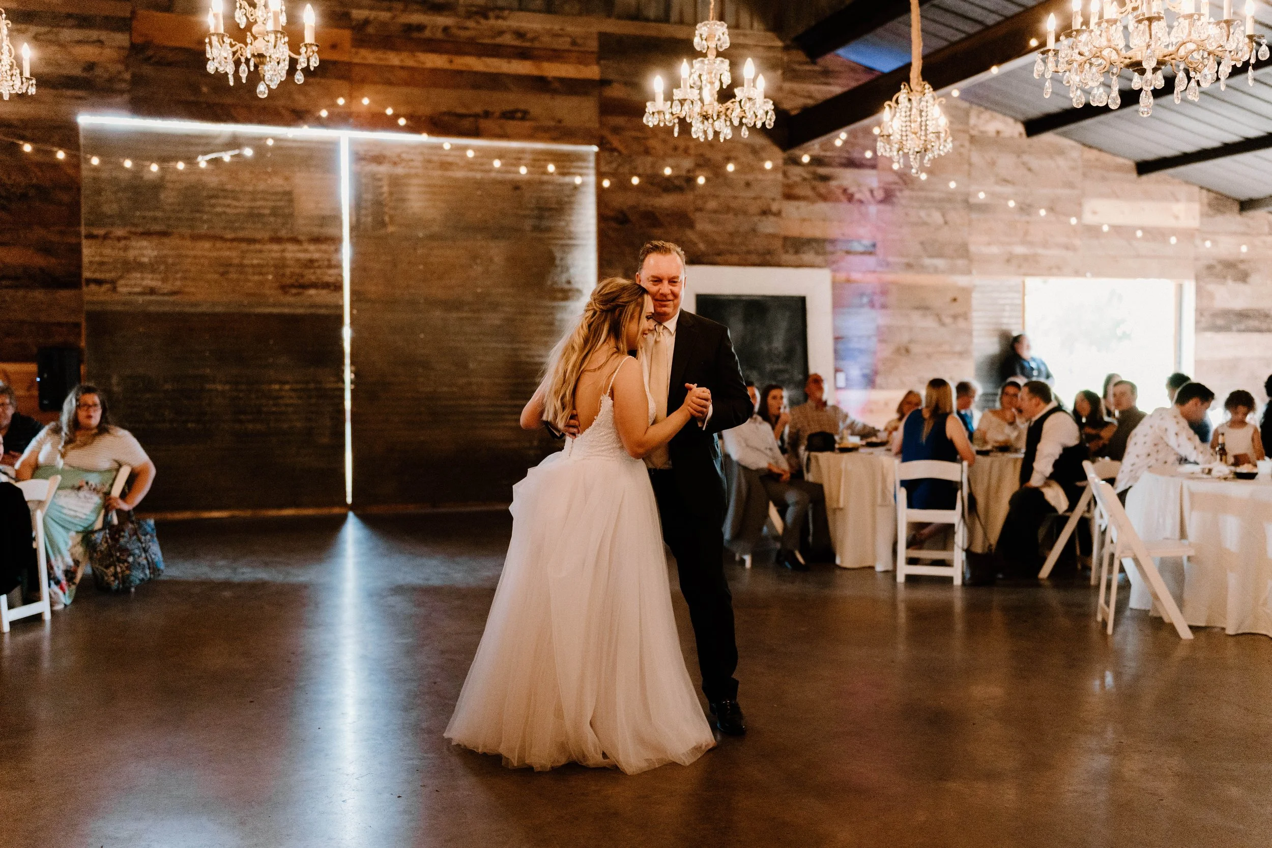 first dance with dad under gorgeous chandeliers