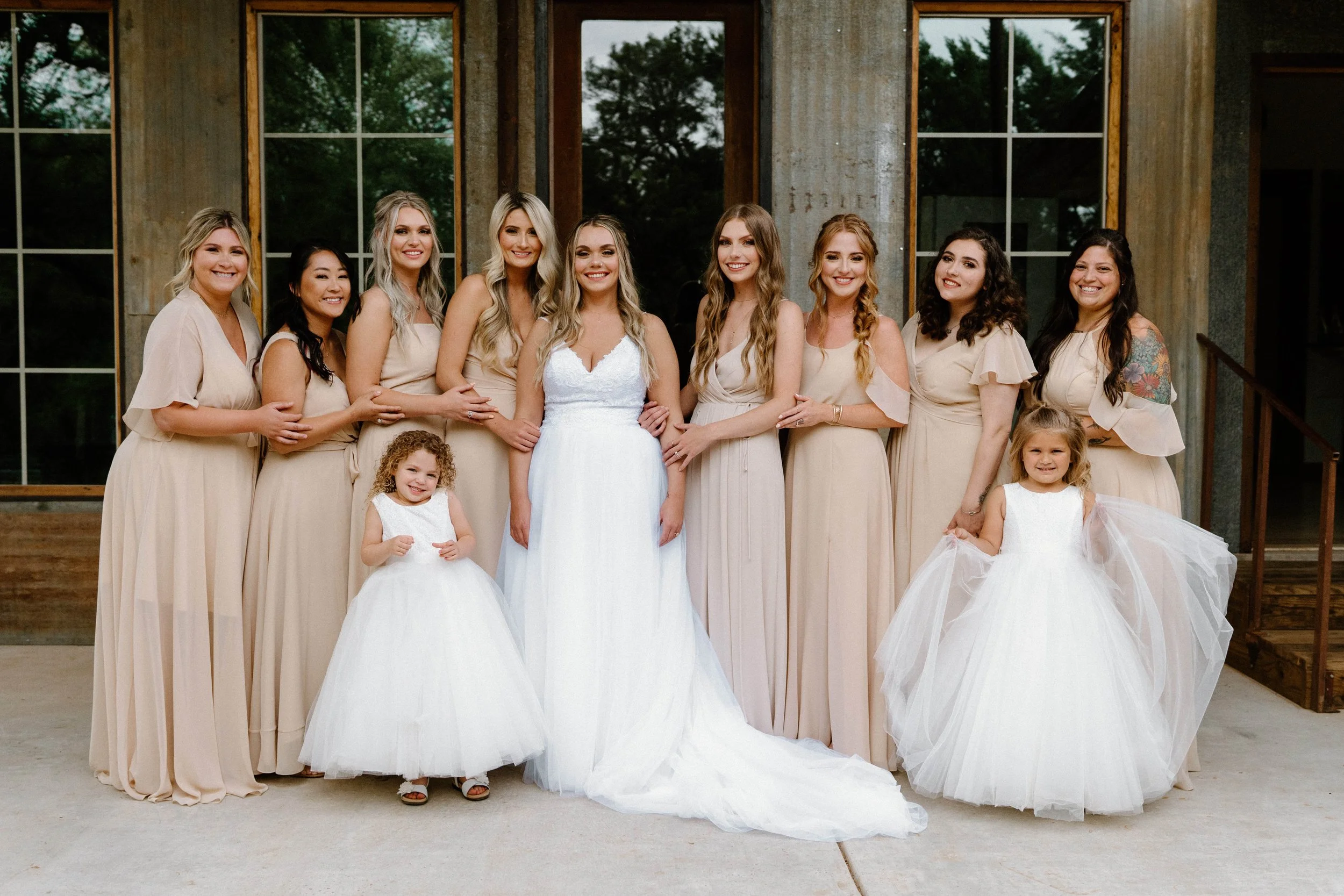 Bridesmaid reveal with adorable flower girls. Rose bridesmaid dresses