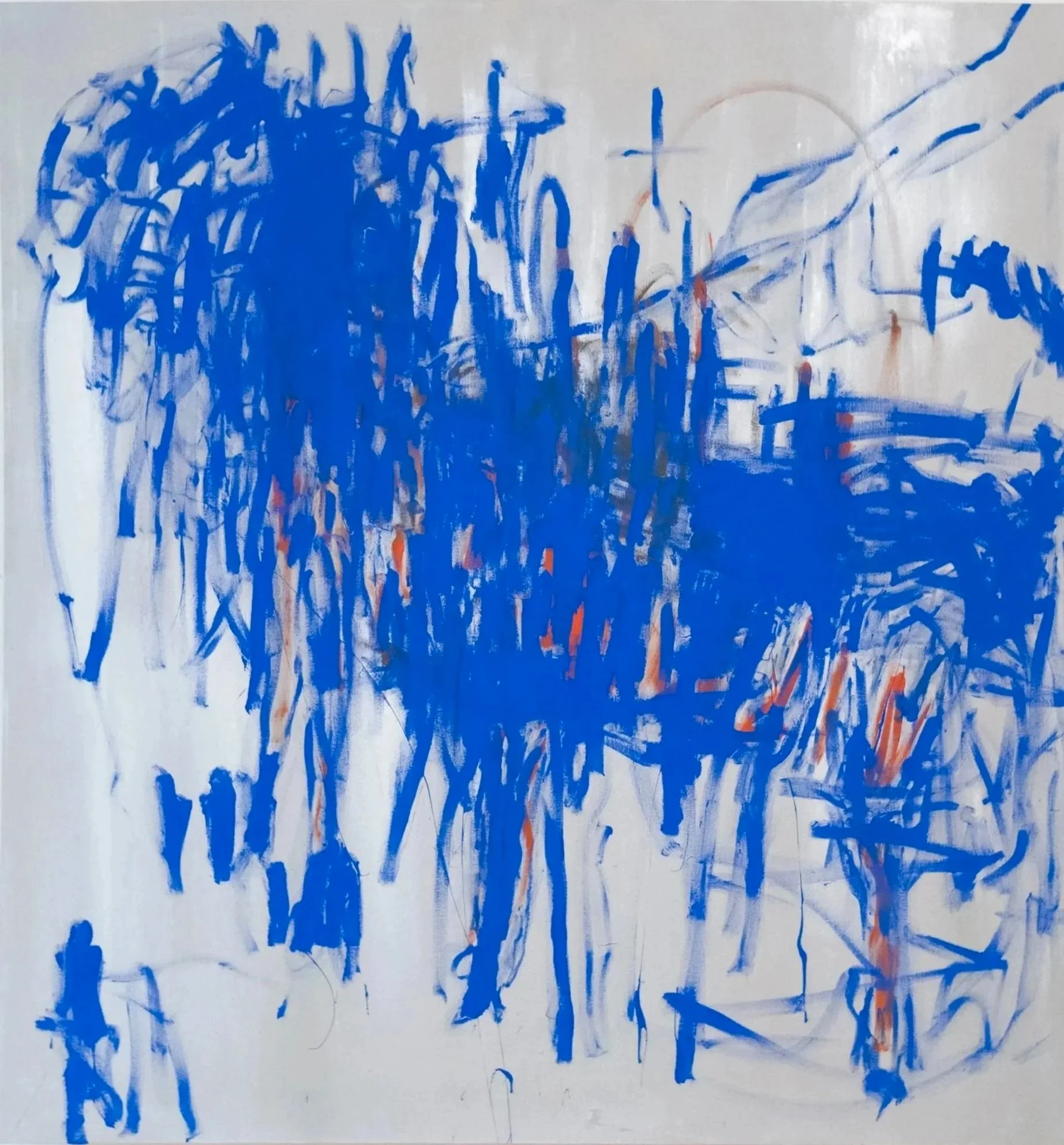 Abstract painting with bold blue brushstrokes, some orange accents, and a white background.