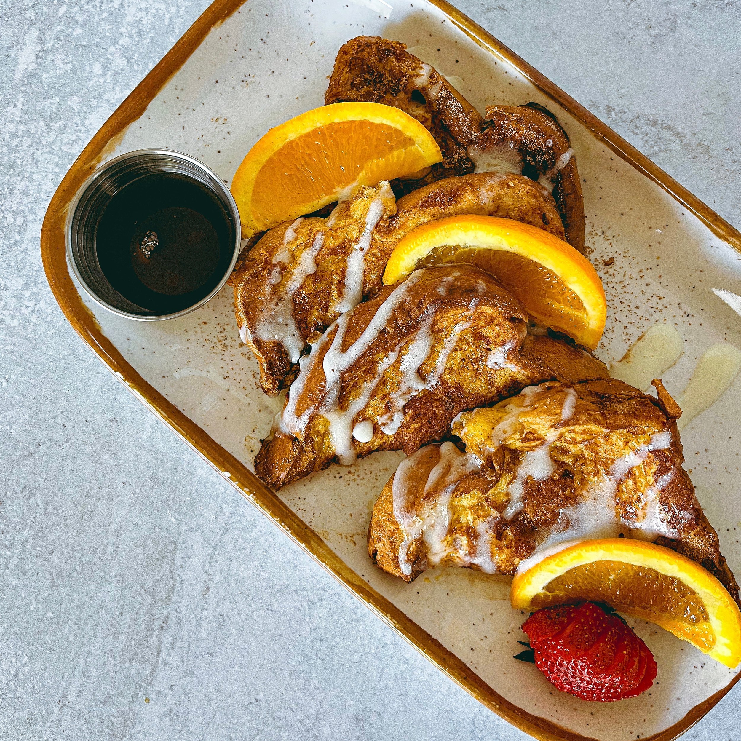 If you haven&rsquo;t tried our Churro French Toast you are missing out 🤤 🍞 Thick cut sweet brioche bread coated with a perfect orange scented churro crust and topped with a cream cheese drizzle, don&rsquo;t be afraid to add bacon on the side for th