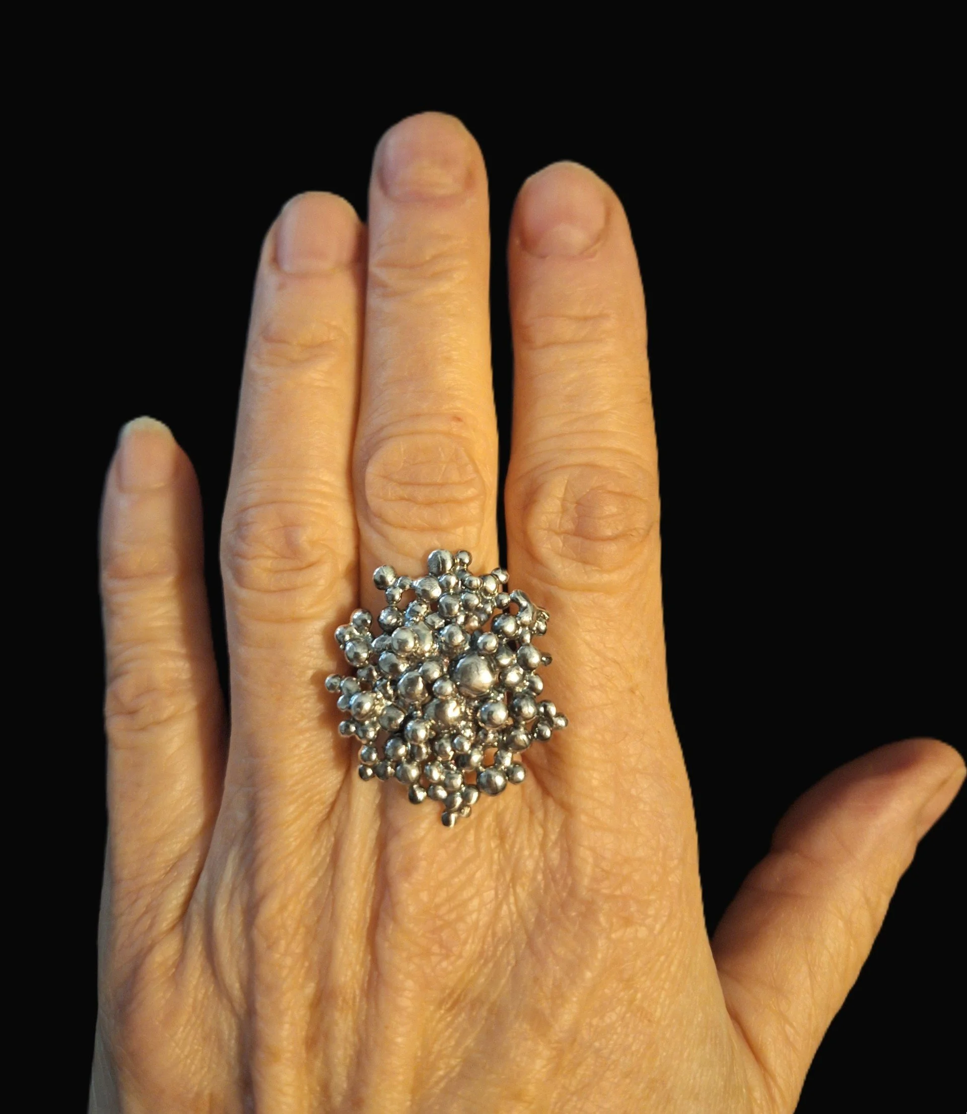 Lisa cosmos ring 0bb1ee08-ea41-400e-b62d-14a8c5465b9f.jpg