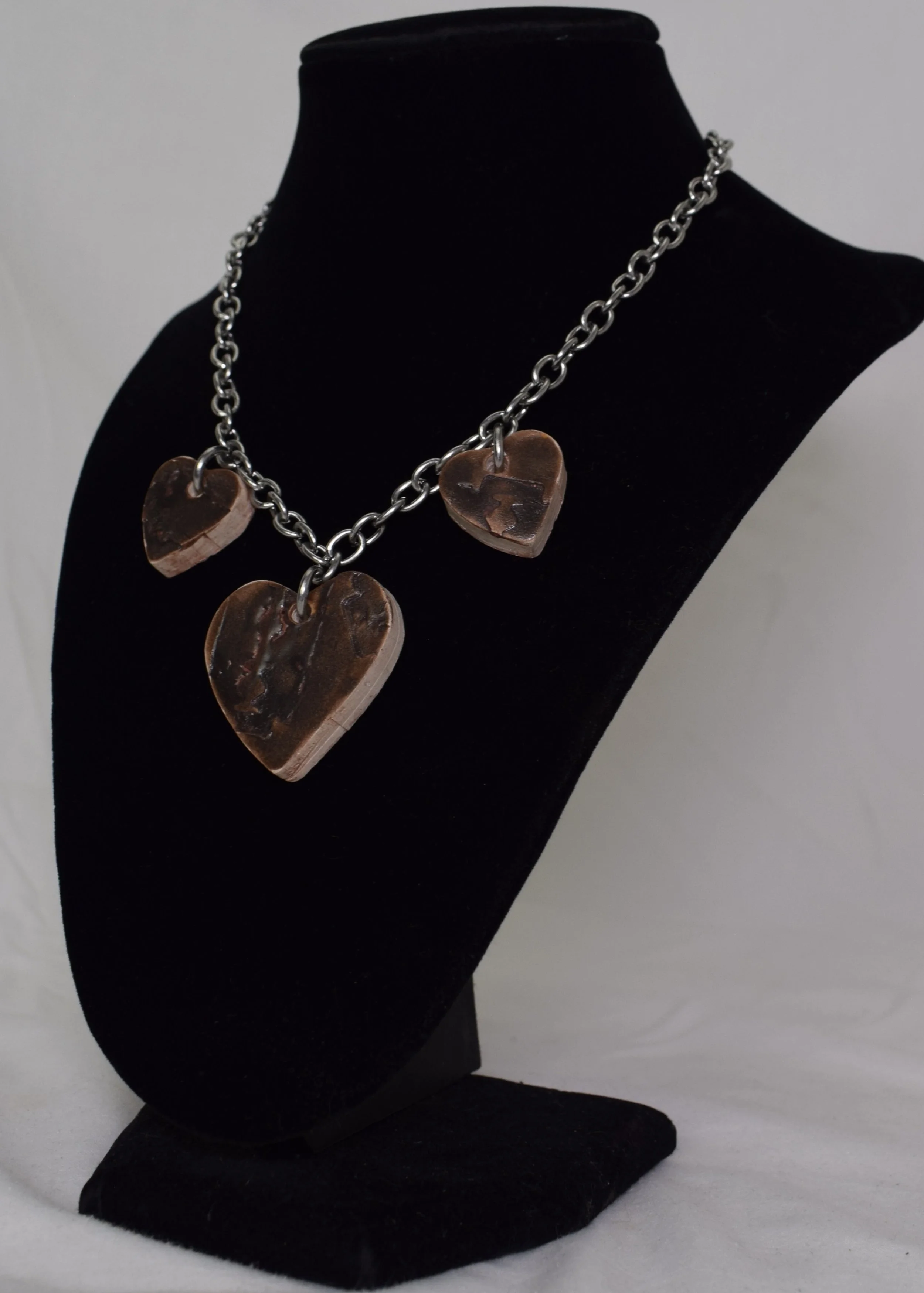 jewels 3 hearts alone DSC_0861.jpeg