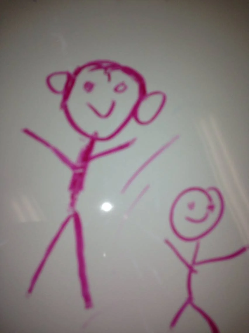 Gwen with kid drawing - little buddy.jpg