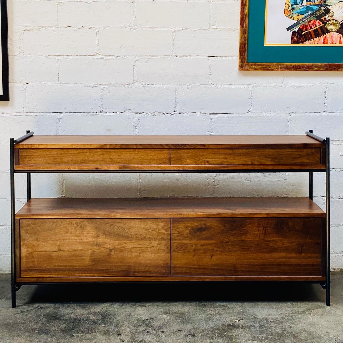 Walnut and steel console with touch latch doors and drawers. #mountainmodern #walnut #bigsky #livinsgtonmontana #steelfurniture