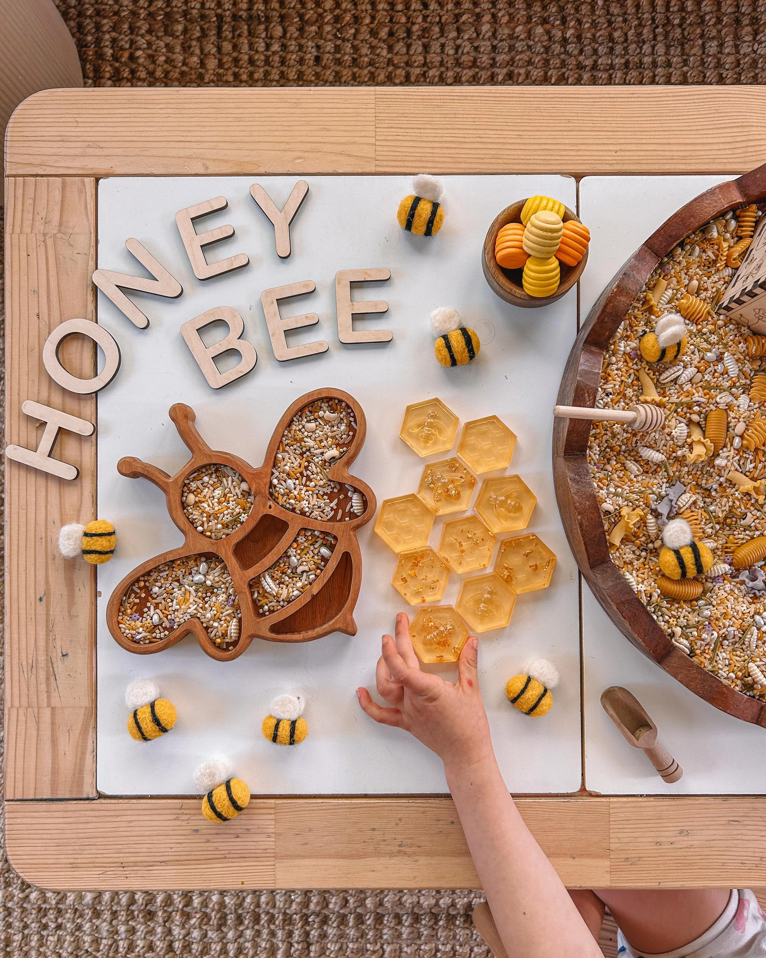 🐝💛🌼 my kiddos have always been fascinated by bees (me too!), so there has been lots of excitement for our bee play this week :) little miss loved exploring this set up &mdash; she worked on counting honeycombs and bees, flying the bees back and fo