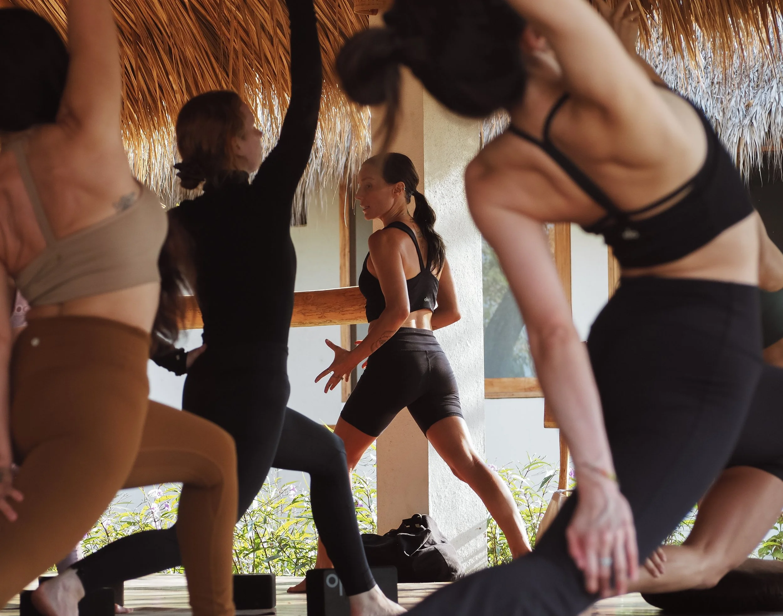 Kayla Nielsen teaching yoga in the open-air shala at Still Salty Escape, a retreat venue in Nicaragua