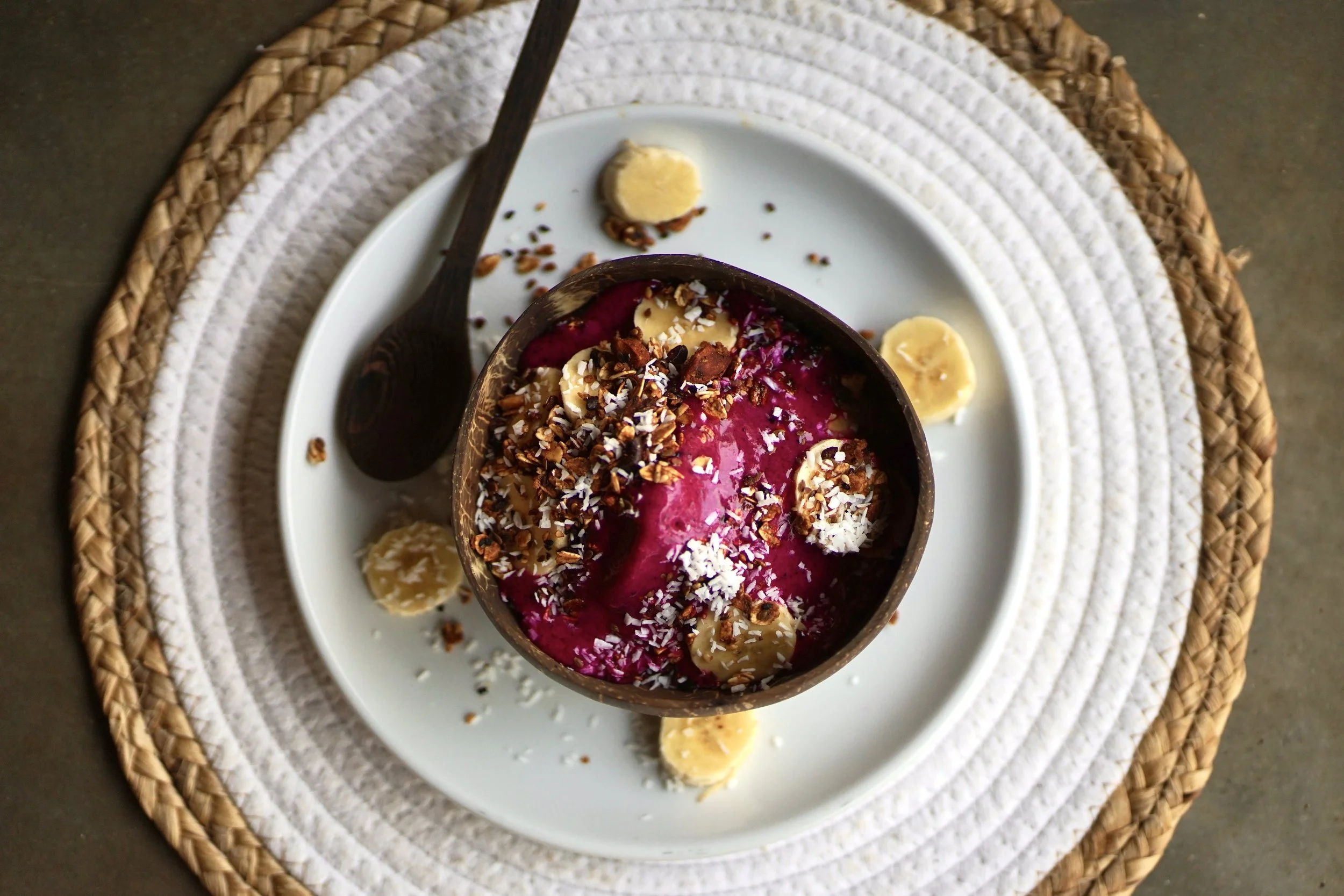 Pitaya smoothie bowl topped with granola, banana, and coconut at Still Salty Escape in Nicaragua