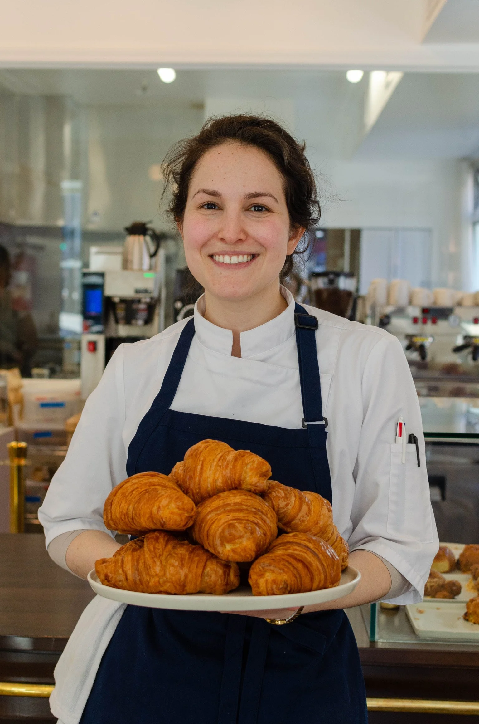 Chef Ariana Barkin holding croissants, Atelier Ariana, Brooklyn, NY