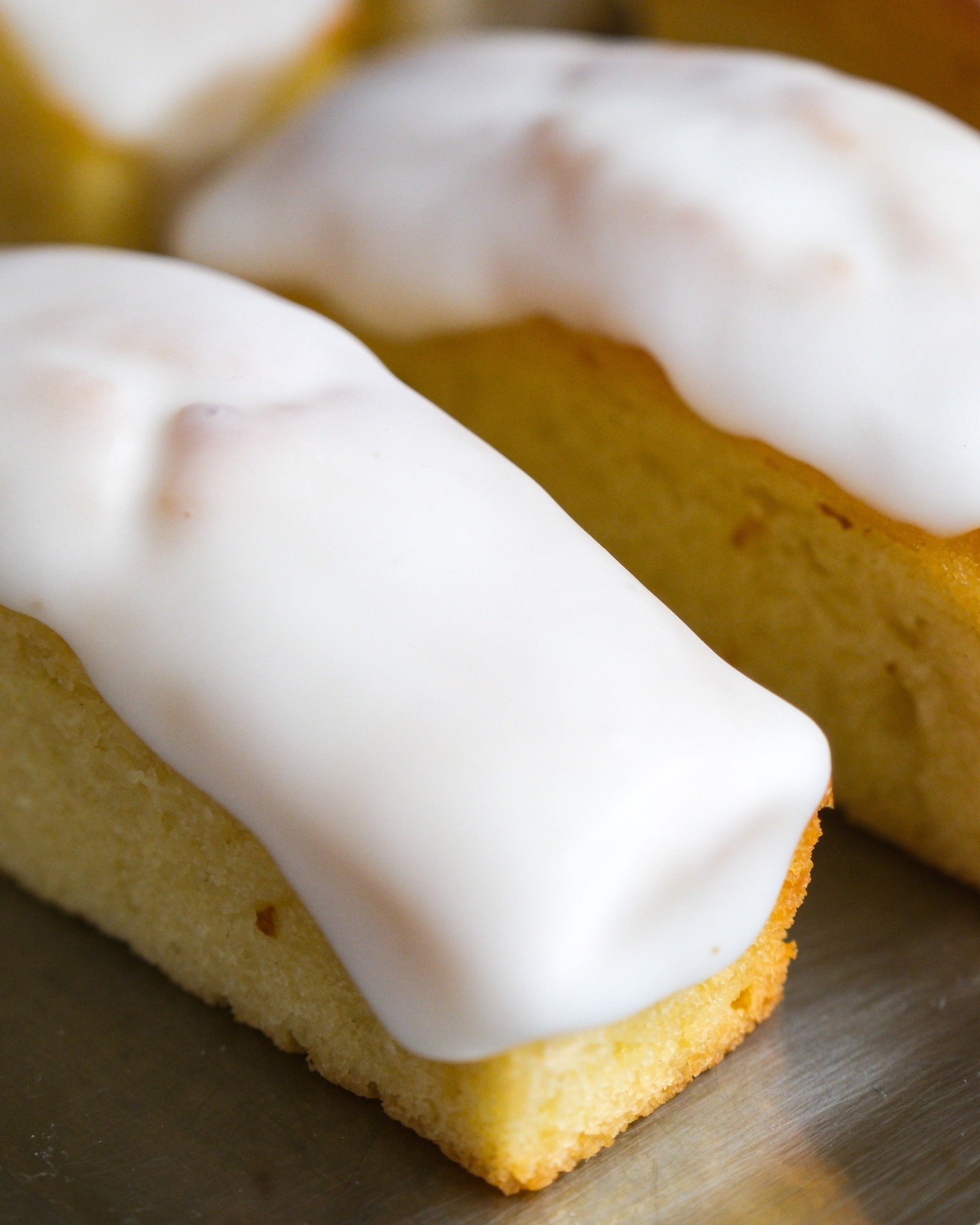 A behind the scenes look at an Atelier staple: our Lemon Cakes.

We make our batter weekly, giving it time to develop that strong lemon flavor, then each cake is stored to preserve freshness before getting glazed with our expertly balanced lemon icin