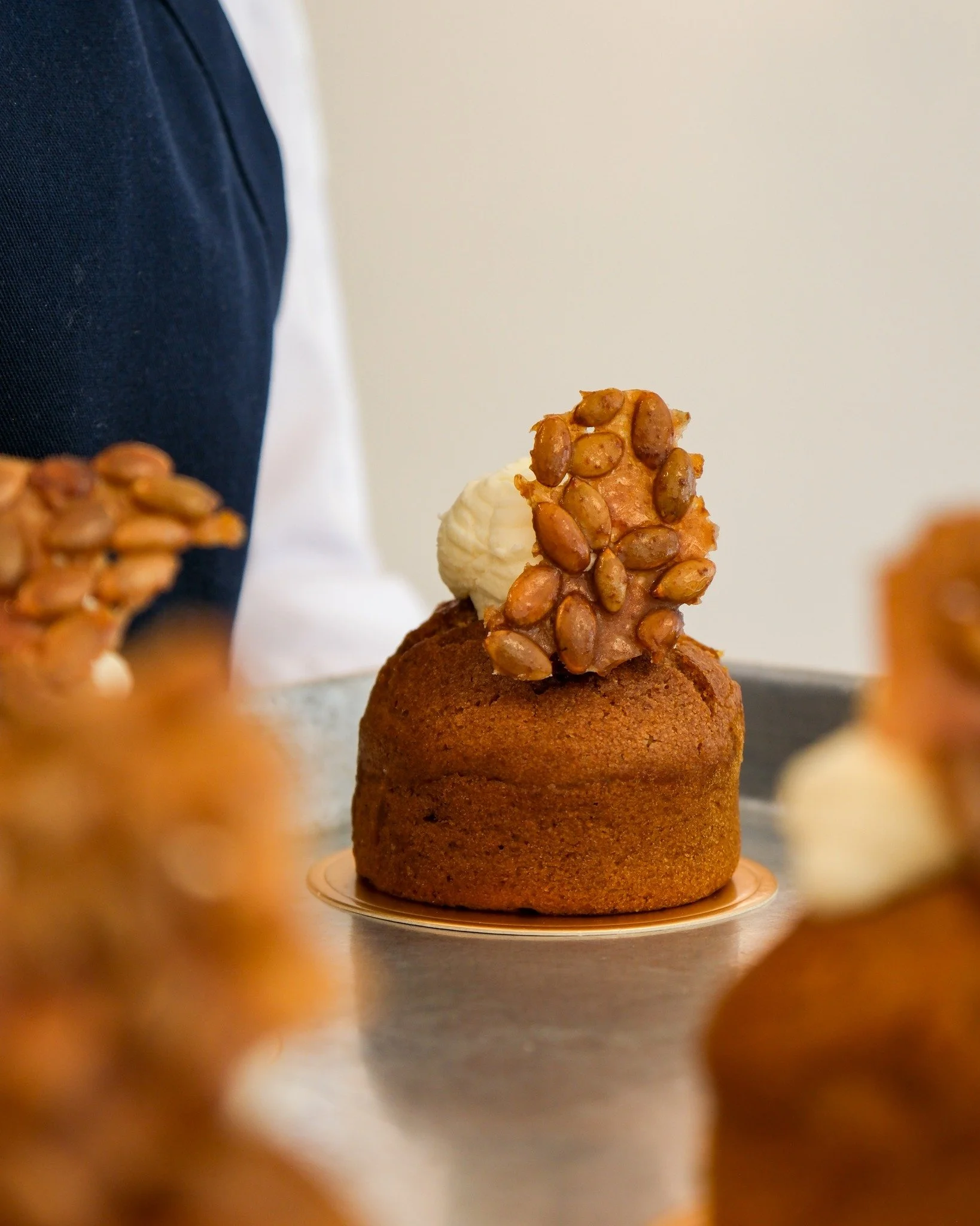Our Pumpkin &amp; Rosemary Cupcake pairs our spiced pumpkin cake with a light rosemary cream, that&rsquo;s finished with a nutty pumpkin seed brittle.

It&rsquo;s our perfectly balanced fall treat: pumpkin, warm spices, earthy rosemary, and a crisp p